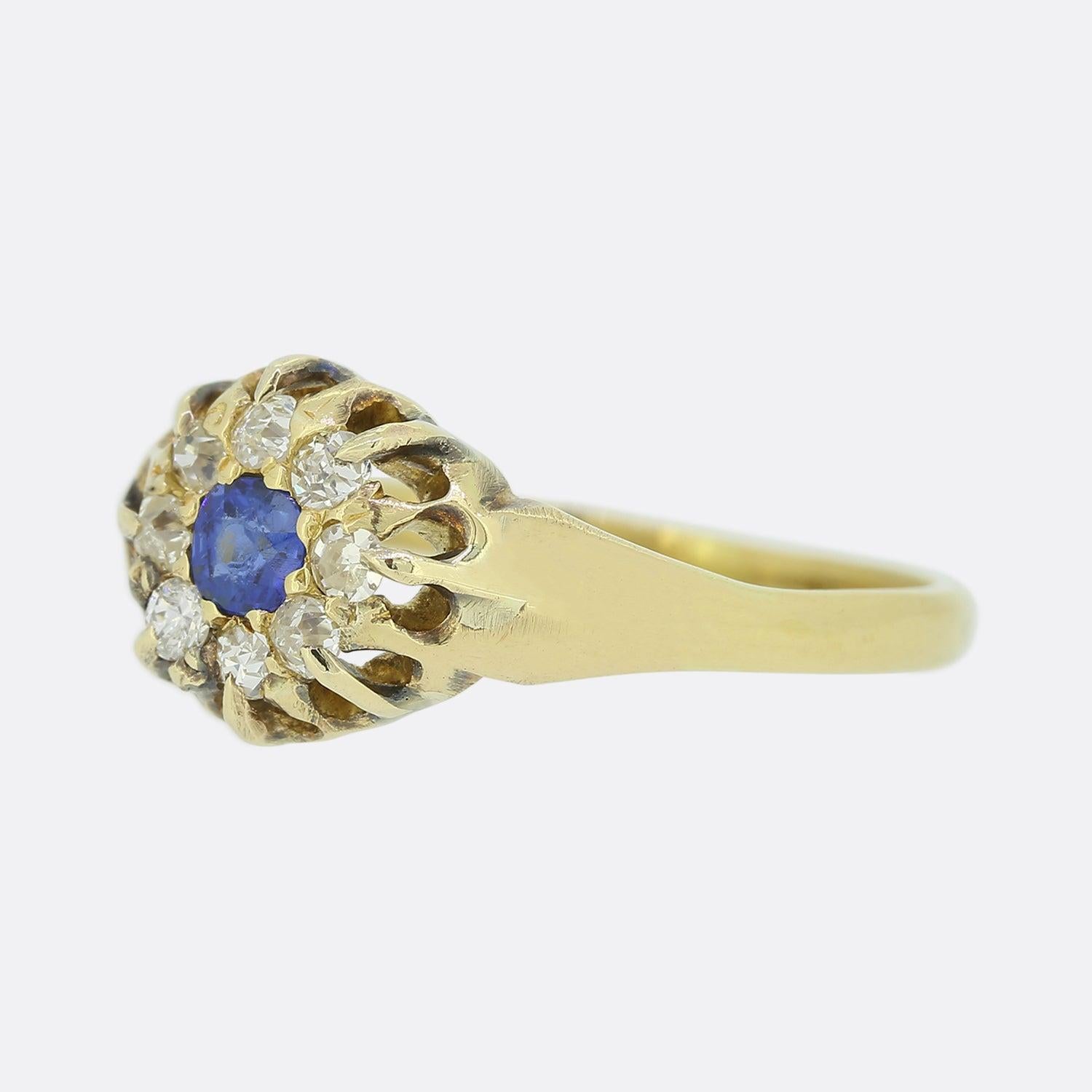 This is a lovely antique Edwardian sapphire and diamond cluster ring. The ring features a centralised sapphire which is surrounded by a cluster of old cut diamonds in a circular shaped setting with an 18ct yellow gold plain band.

Condition: Used