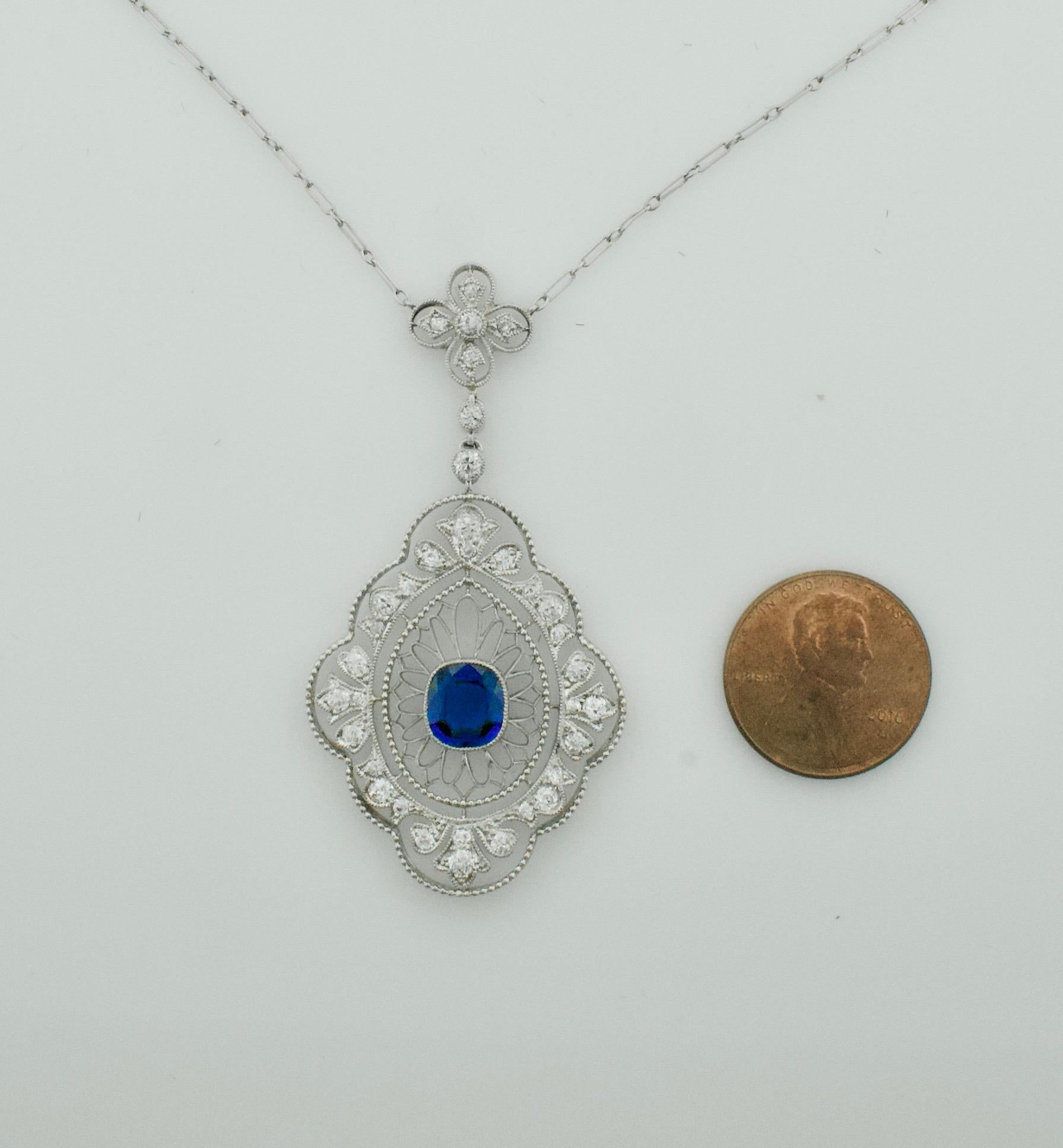 Edwardian Sapphire and Diamond Necklace in Platinum circa 1915
One Cushion Cut Sapphire Weighing 1.70 Carats Approximately [bright with no imperfections visible to the naked eye]
Thirty Three Old Mine Cut Diamonds Weighing 1.50 Carats Approximately
