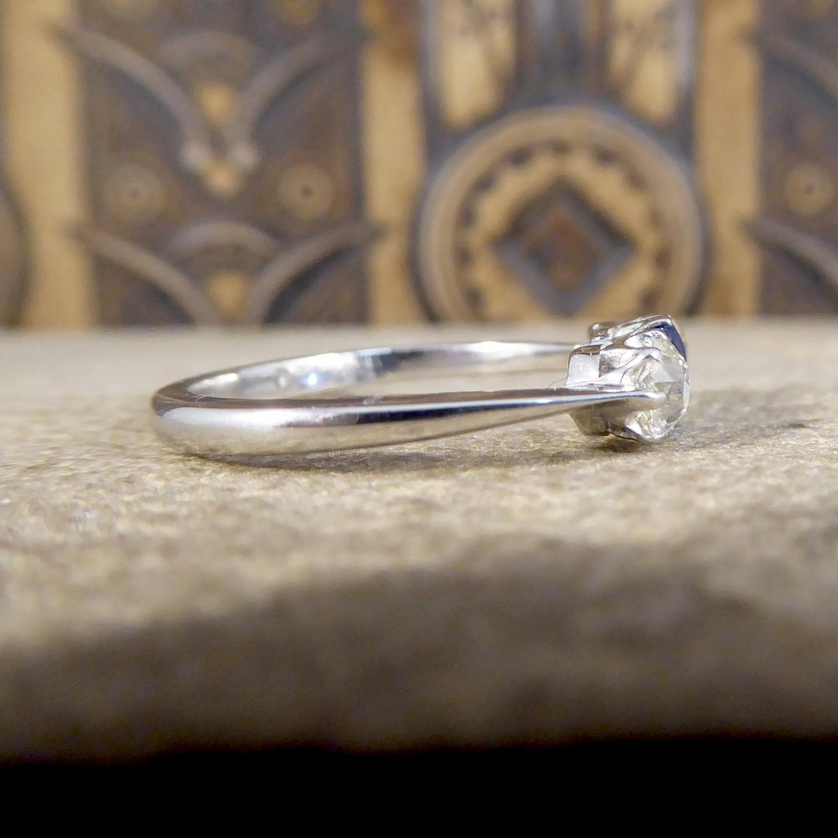 Round Cut Edwardian Sapphire and Diamond Three-Stone Ring in Platinum