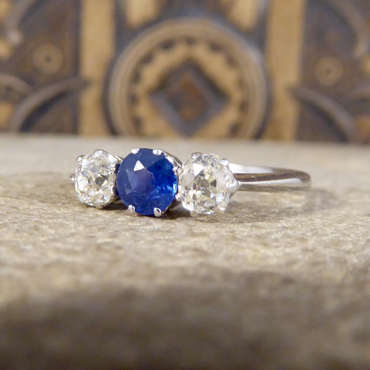 Women's or Men's Edwardian Sapphire and Diamond Three-Stone Ring in Platinum