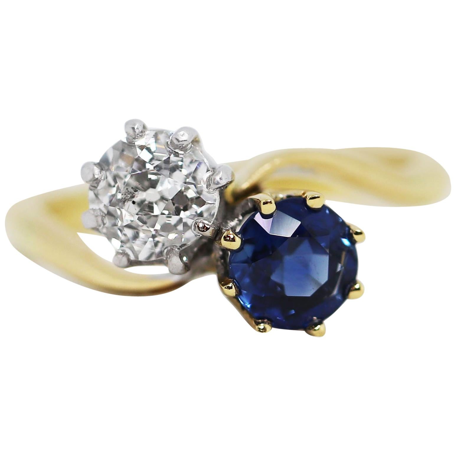 Edwardian Sapphire and Old Mine Cut Diamond Two-Stone Twist Engagement Ring