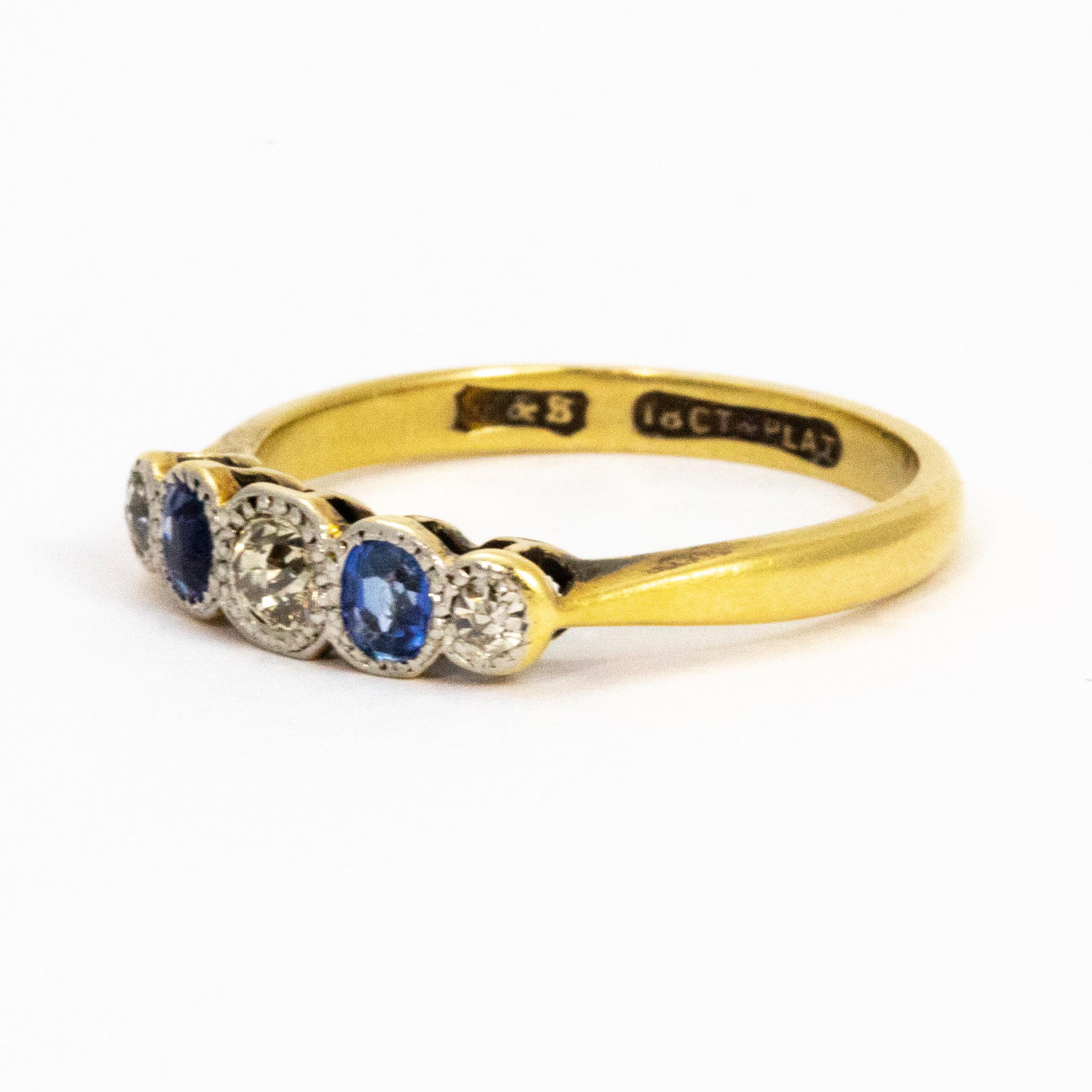 Dainty and sparkly sapphire and diamond ring very simply set in platinum with a 18ct gold band.

Ring Size: N or 6 1/2