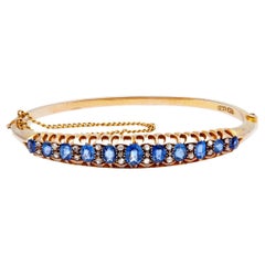 Edwardian Sapphire Diamond 9 Karat Yellow Gold Hinged Bangle Bracelet