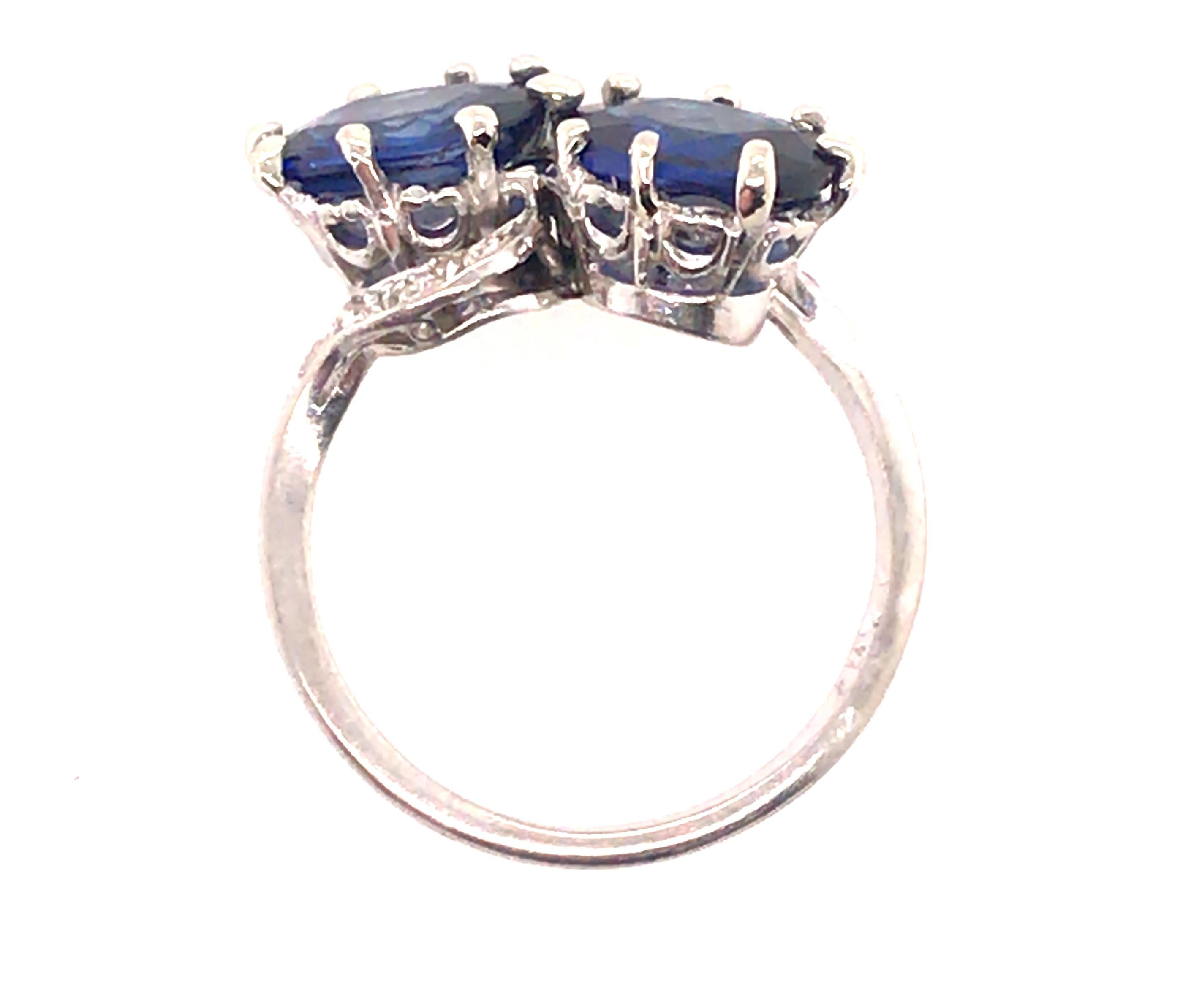 Genuine Original Edwardian Antique from 1900's Vintage Bypass Sapphire Diamond Cocktail Ring 3.91ct Platinum 


Featuring 2 Brilliant Bold Natural Blue Oval Cut Sapphires Totaling 3.75ct 

Each Sapphire is Nearly 2 Carats

Genuine Rose Cut Natural