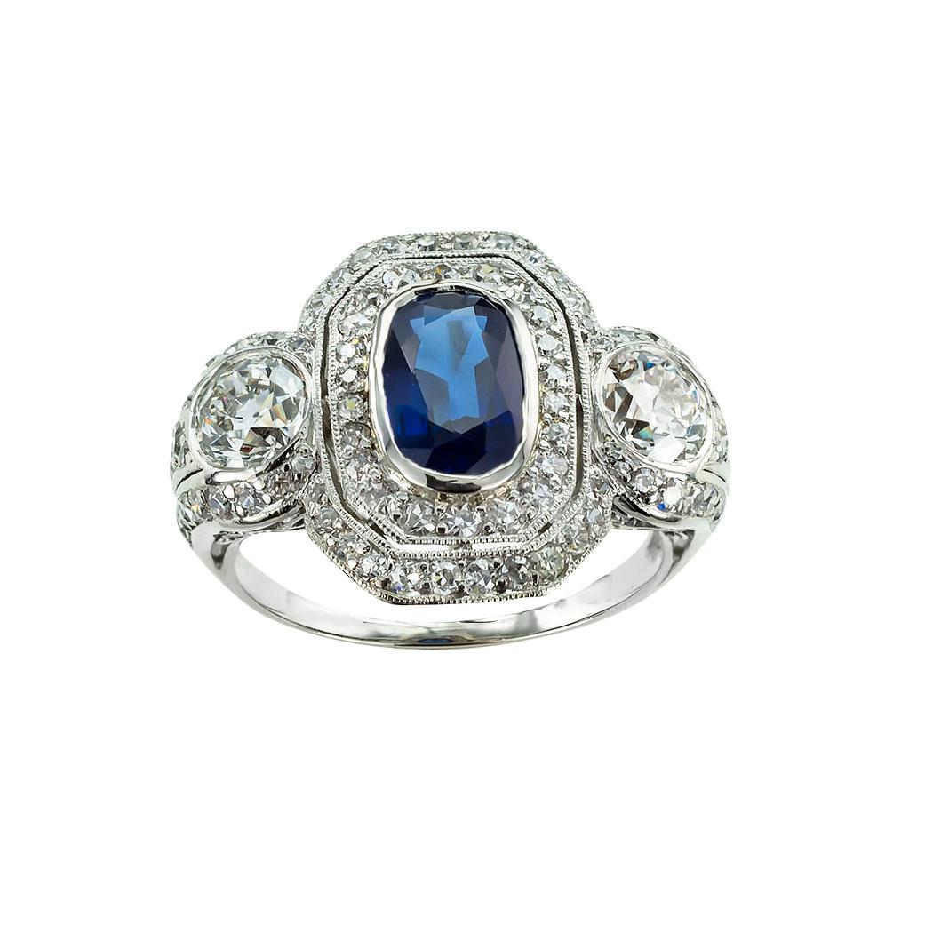 Edwardian sapphire diamond and platinum ring circa 1910. *

ABOUT THIS ITEM:  #R-DJ531D Scroll down for specifications.  This genuine Edwardian sapphire and diamond ring is most definitely a sparkling wonder, loaded with old-cut diamonds. 