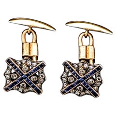 «Gemelos eduardianos con zafiro y diamantes en forma de cruz de San Andrés, hacia 1910»