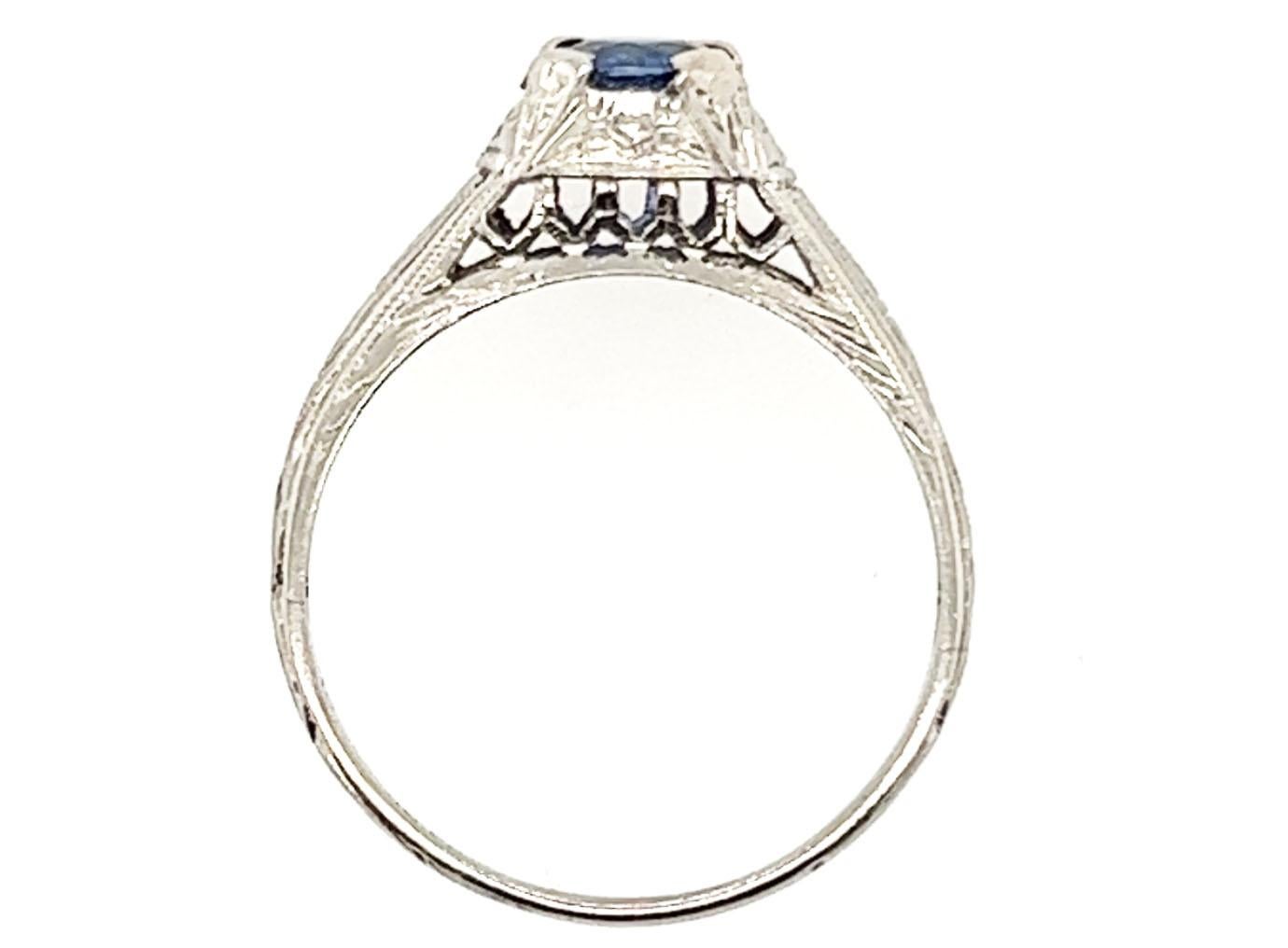 Genuine Original Edwardian Antique from 1900's - 1910's Vintage Sapphire Solitaire Ring .70ct Platinum 


Featuring a Deep Ocean Blue .70 Carat Genuine Natural Round Sapphire Center

Perfect Alternative Engagement Ring

Six Hand Engraved Flowers