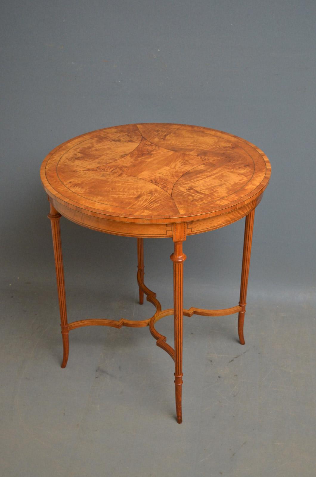 Sn4490 Fine quality and very elegant Edwardian satinwood occasional table, having stunning top with inlay decoration above inlaid frieze and 4 slender, string inlaid legs united by shaped stretchers. This antique table retains its original soft and
