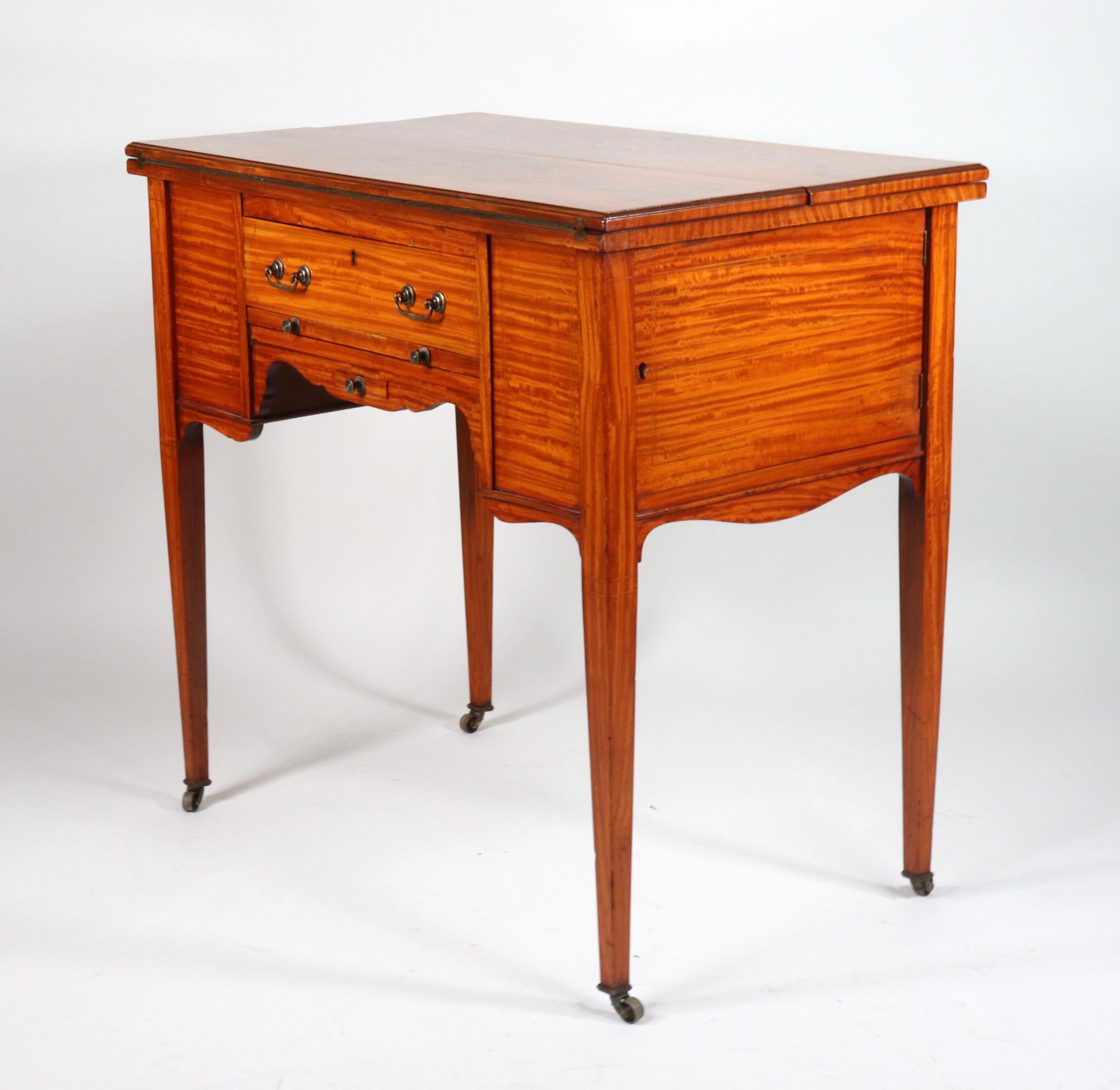This magnificent Circa 1910 Edwardian Satinwood hand-painted game table displays signs of fine craftsmanship and ingenuity. From the 17th to the 19th Century, card and board games were means to socialize and gamble large sums of money among the