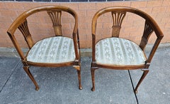Edwardian Satinwood Inlaid Mahogany Barrel-Back Upholstered Club Armchairs, Pair