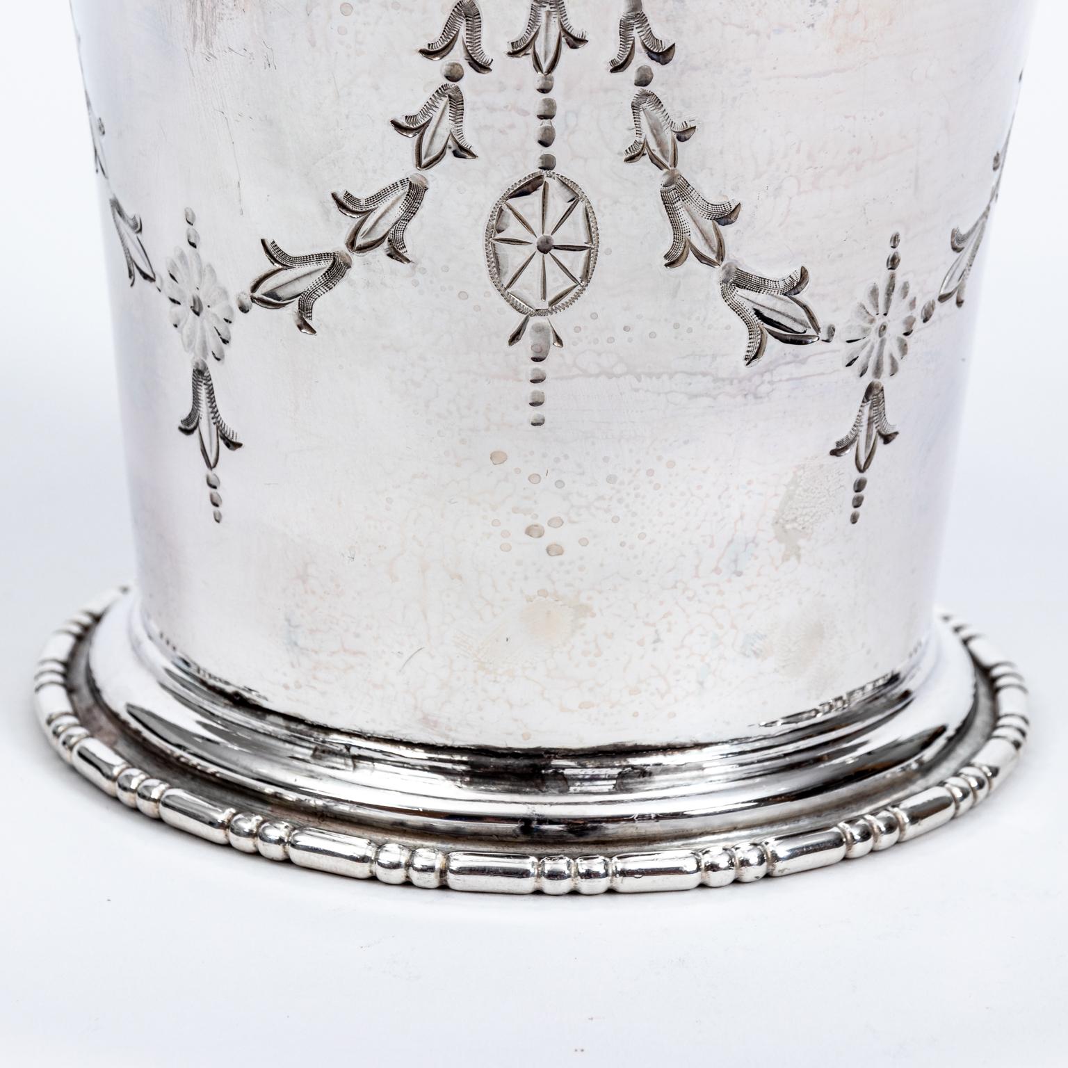 Circa 1900s Edwardian Scottish silver plate cache pot, elaborately detailed with Roman swags of bellflowers and ribbon bows on the exterior along with bead-and-reel trim on the top rim and base of the pot. Made in Scotland. Please note of wear
