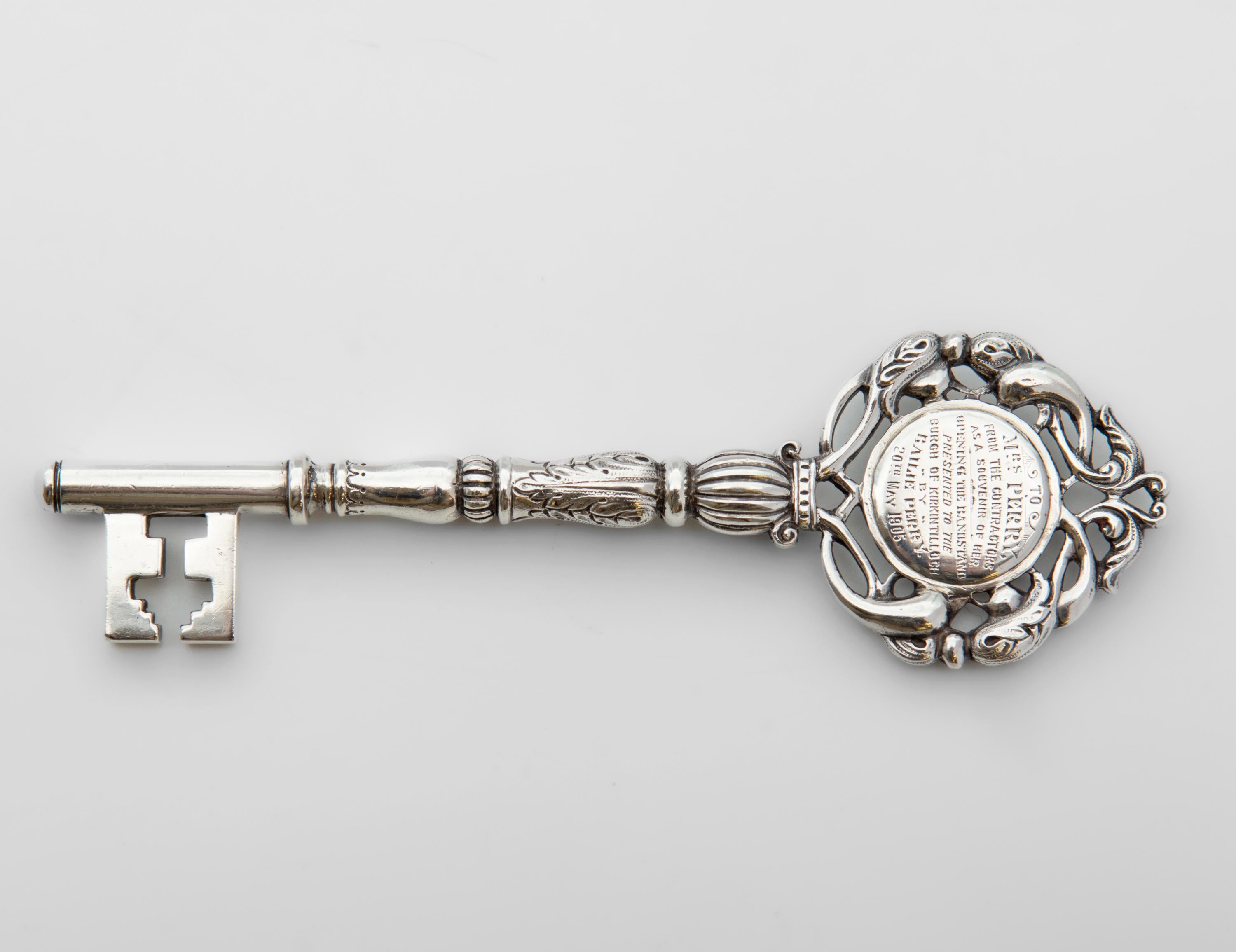 Excellent quality Edwardian solid sterling silver presentation key. Hallmarked in Glasgow in 1904/1905 by James Weir.

Engraved to both sides, one side reads: 