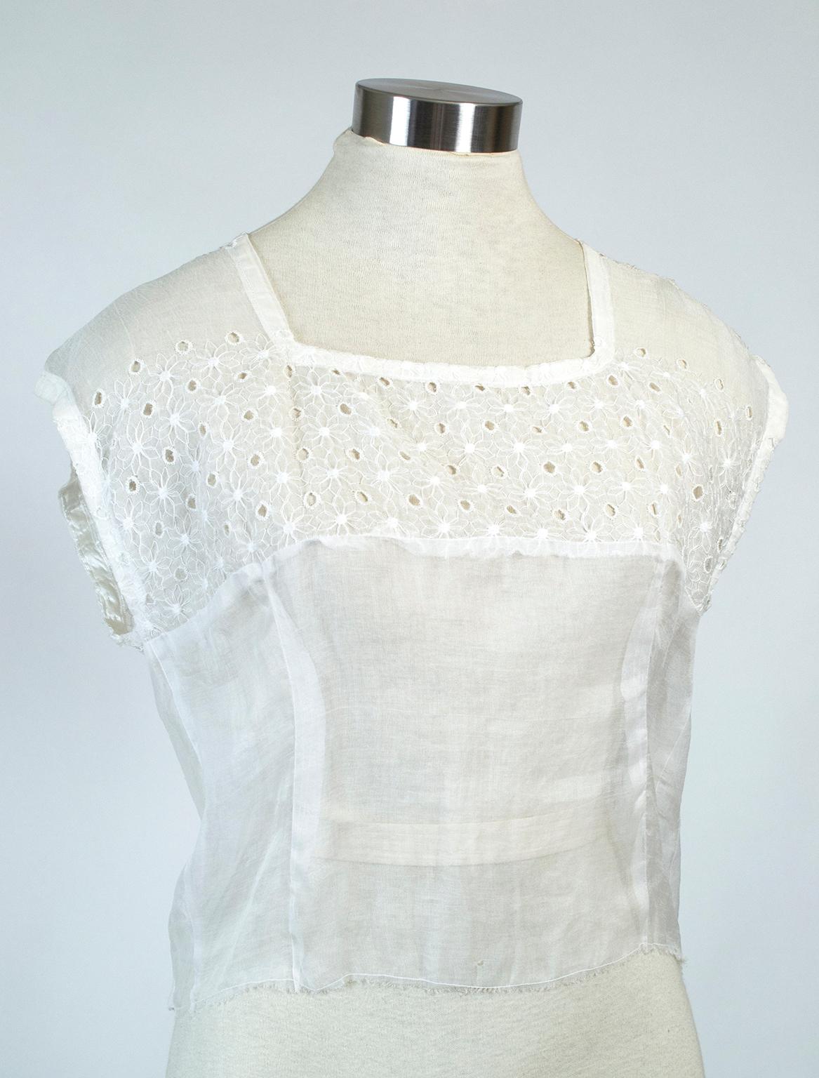 As delicate as a butterfly’s wings, this timeless blouse is as fashionable, ladylike and elegant today as it was a century ago. The square neckline adds unexpected geometry and makes it even more wearable with modern fashion.

Sheer, sleeveless