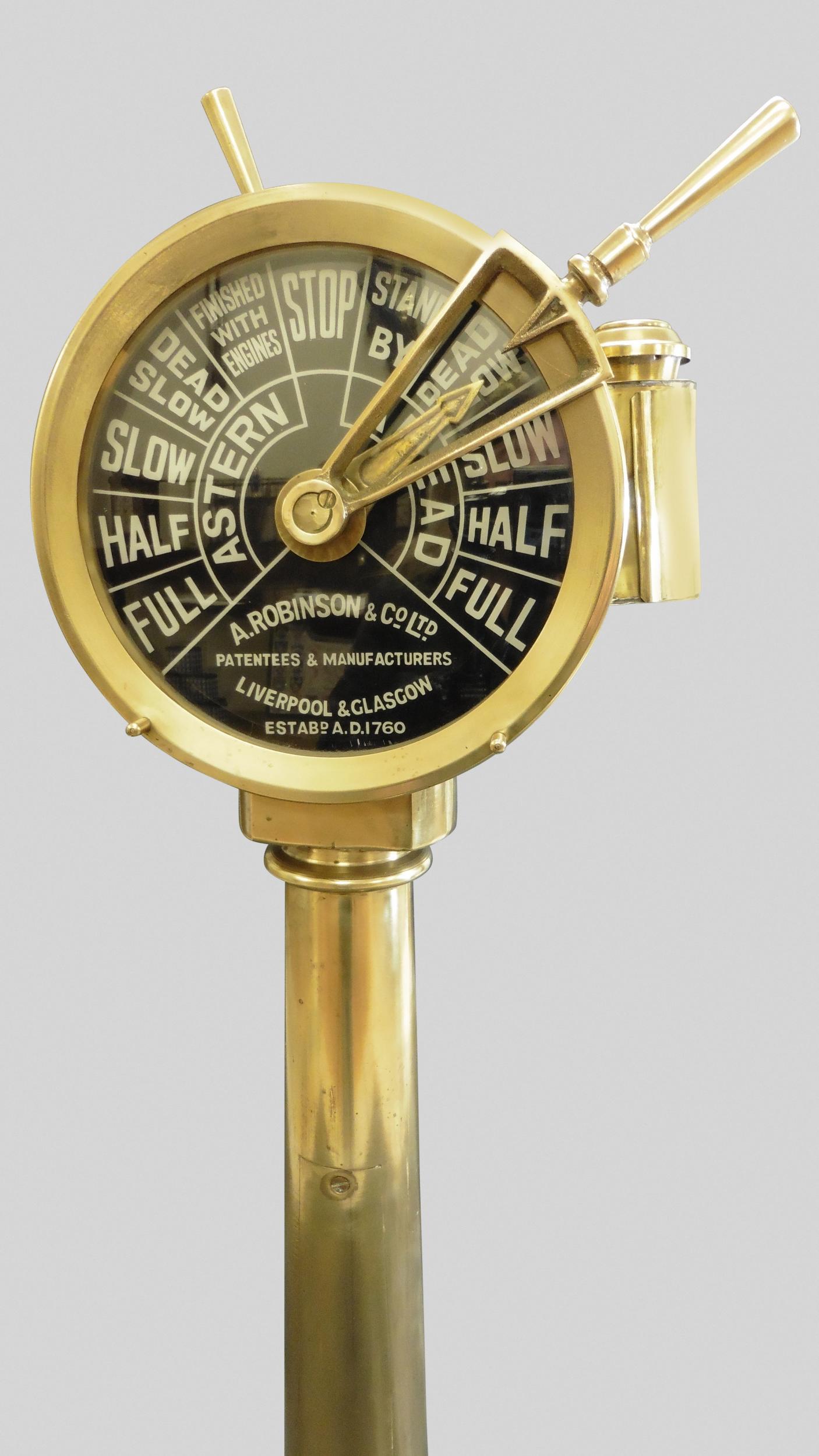 Edwardian ships telegraph, c.1900



Brass ships telegraph standing on a later turned, chamfered mahogany base with two conforming black enamel dials signed ‘A.Robinson and Co Ltd, Patents and manufacturers, Liverpool and Glasgow, Established