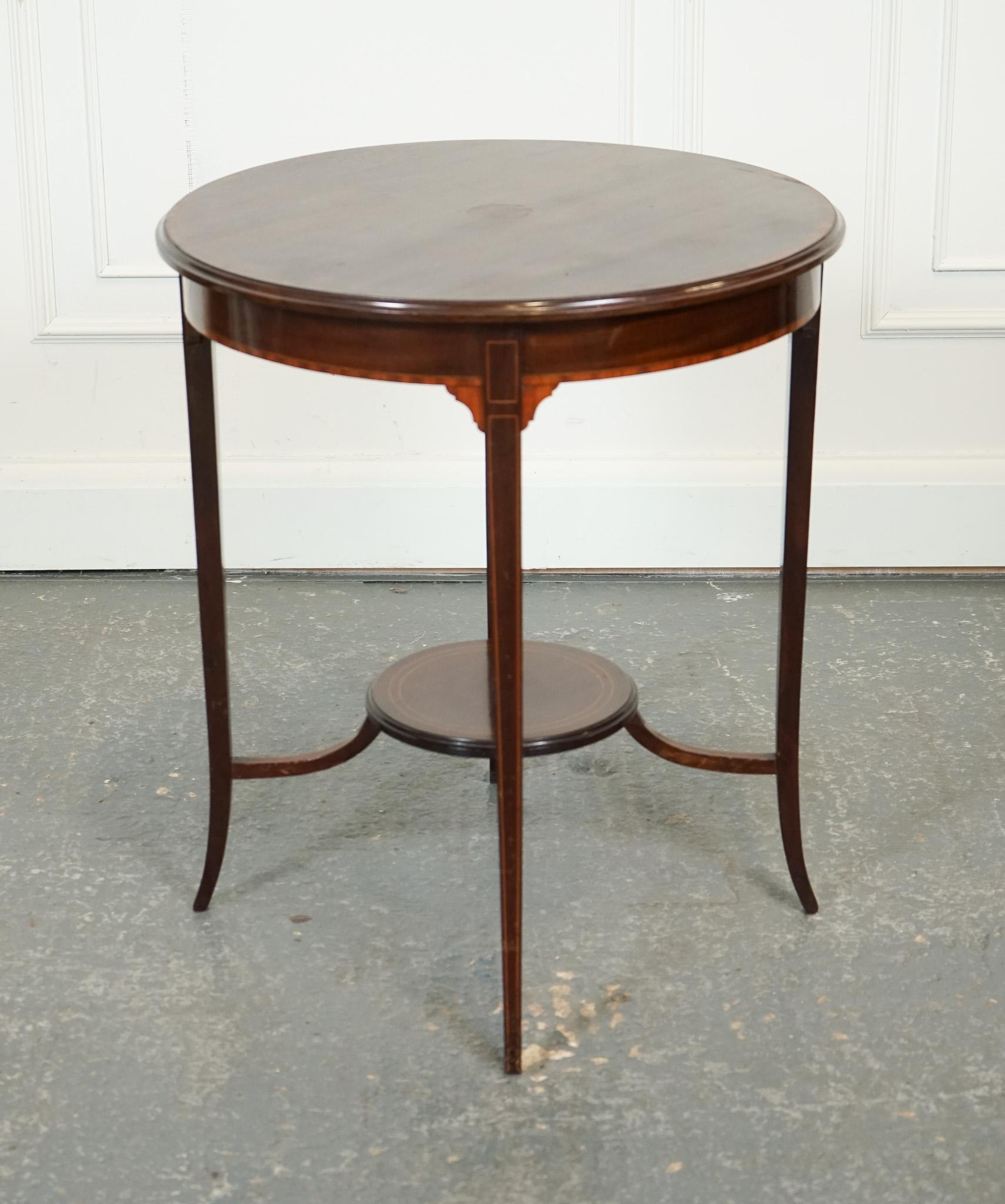 

We are delighted to offer for sale this Edwardian Side End Wine Lamp Table.

This Edwardian side end wine lamp table is a beautiful and versatile piece of furniture that showcases the elegance and craftsmanship characteristic of the Edwardian
