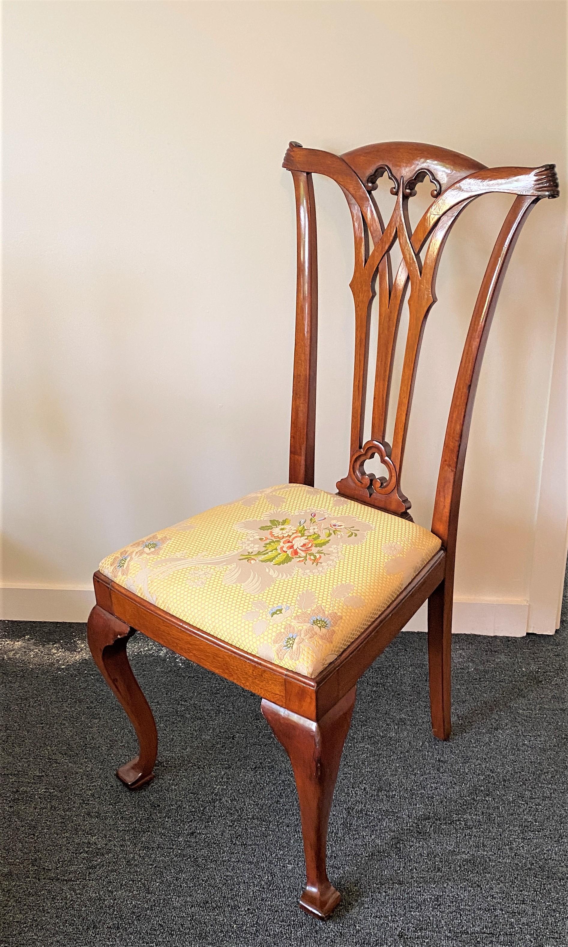 Antique Edwardian side chair Mahogany Chippendale Gothic Queen Anne details Yellow flowered upholstery Desk Chair - from a Palm Beach estate.

This was used as an elegant desk chair, but it matches the 10-chair dining set listed elsewhere on