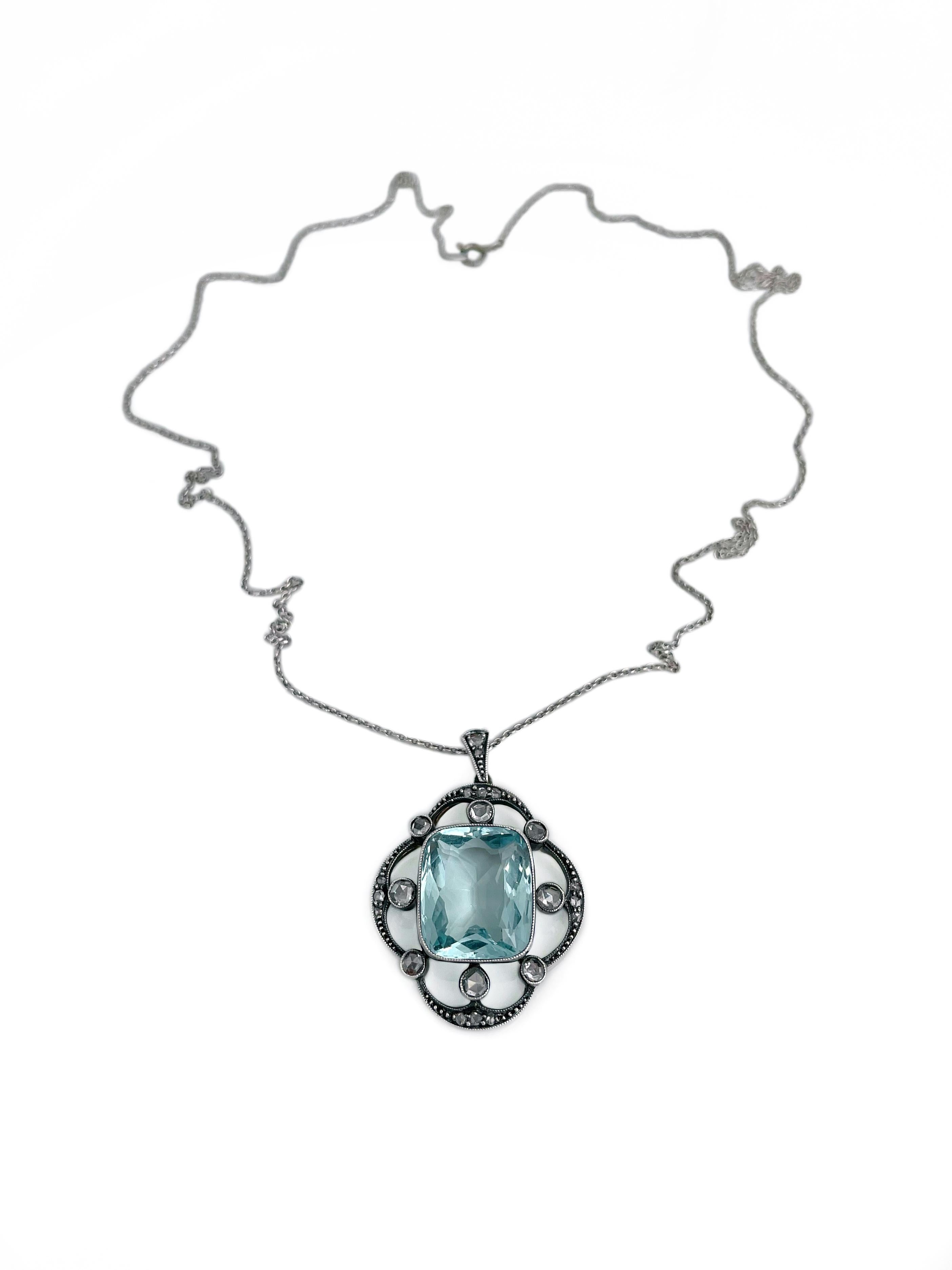 Il s'agit d'un collier pendentif édouardien en argent 925 et en or 9K. Circa 1920. 

La pièce comporte :
- 1 aigue-marine (taille coussin, 9,00ct, gB 2/2, VS)
- 22 diamants (taille rose, TW 0,65ct, RW-W, VS-SI)  

Poids du pendentif : 6,39
