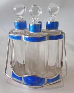 Edwardian Silver and Guilloché Enamel Four-Bottle Scent Set
