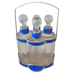 Edwardian Silver and Guilloché Enamel Four-Bottle Scent Set