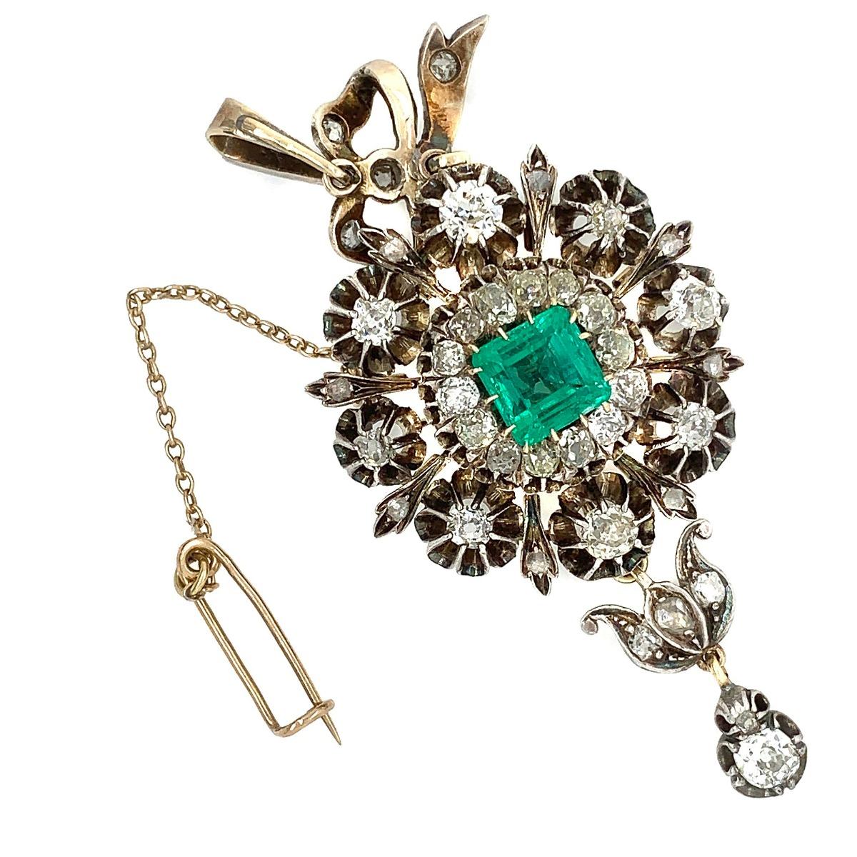 Period: Edwardian
Metal: Silver & Gold 
Condition: Excellent
Gemstone: Diamond & Emerald
Total Diamond Weight: 4 CT
Square Cut Emerald Weight: 3 CT
Item Weight: 21.5 grams
Length: 2.8 inch
Width: 1.3 inch