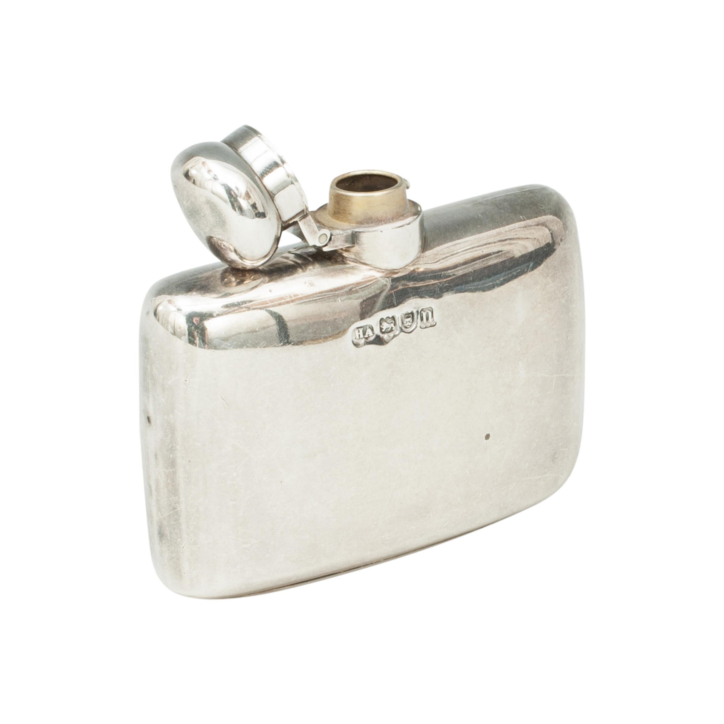 Small Edwardian silver hip flask.
A beautiful small silver hip flask with a curved profile. The flask with simple bayonet screw top lid and hallmarked London 1908 with the silversmith mark of Atkin Brothers, bottom engraved 2 ½ OZ.

Taken from