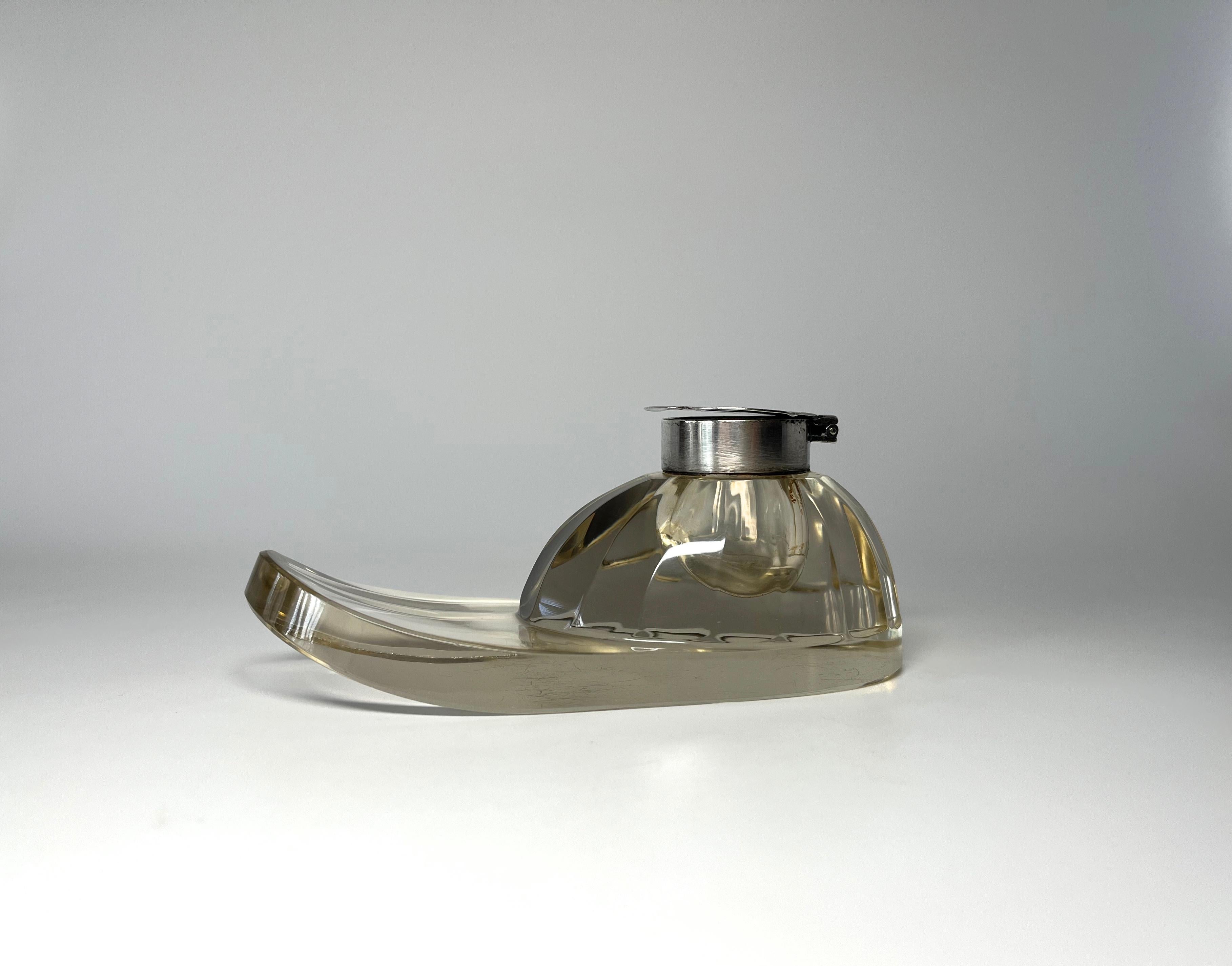 Edwardian cut glass jockey cap inkwell by Hukin & Heath, mounted on a hallmarked English silver collar.
Hinged collar with hallmark and engraved monogram cover
Hallmarked Birmingham 1908
Unusual and immensely collectible 
Length 5.5 inch, Height