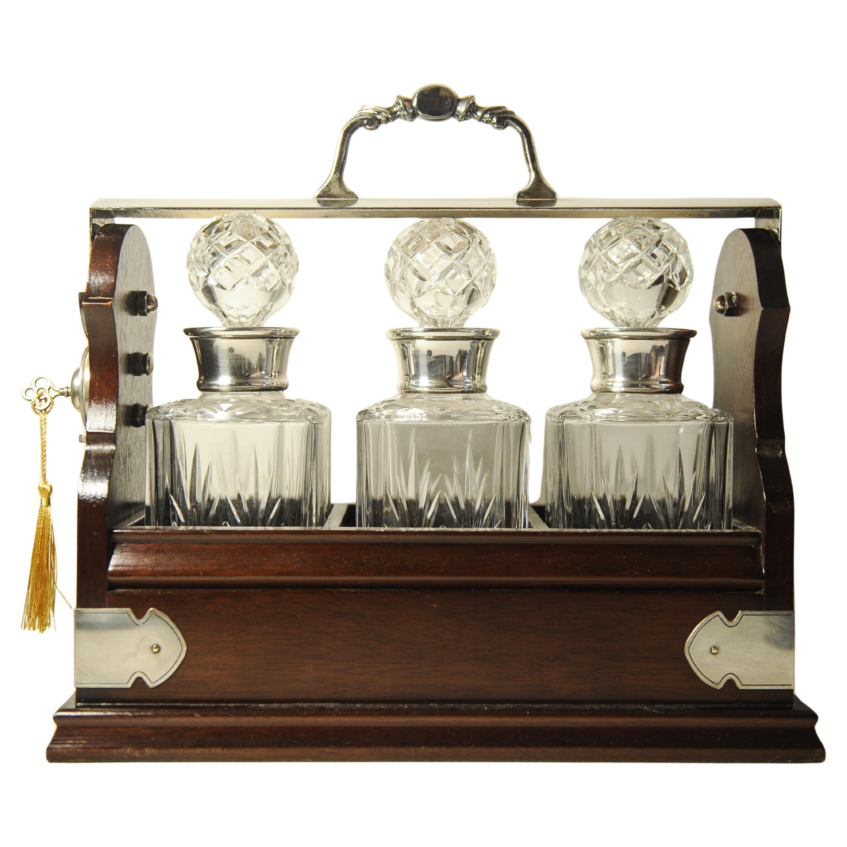 Edwardian Tantalus With A Set of Three Square Cut Glass Decanters For Sale 5