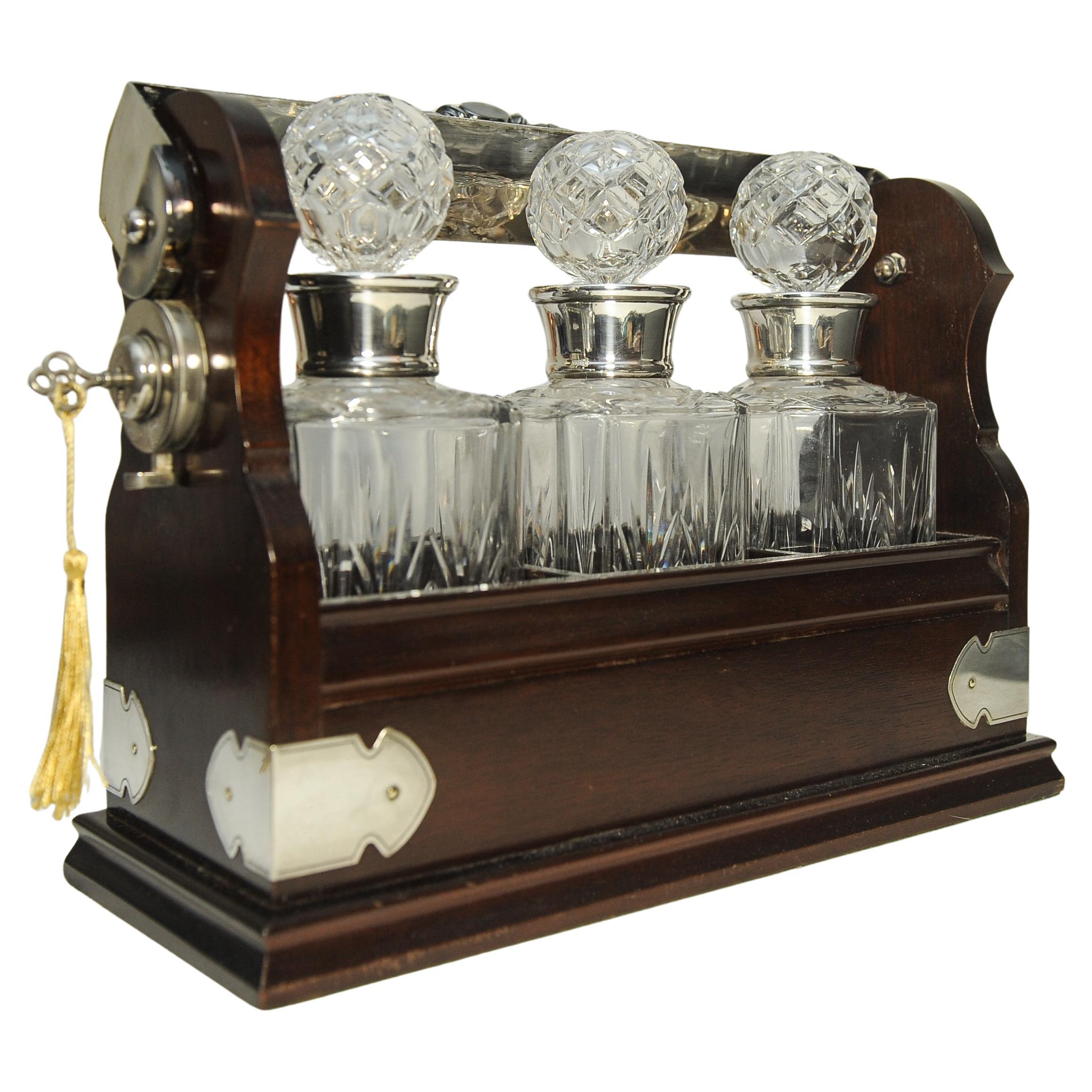 Edwardian Tantalus With A Set of Three Square Cut Glass Decanters For Sale 3