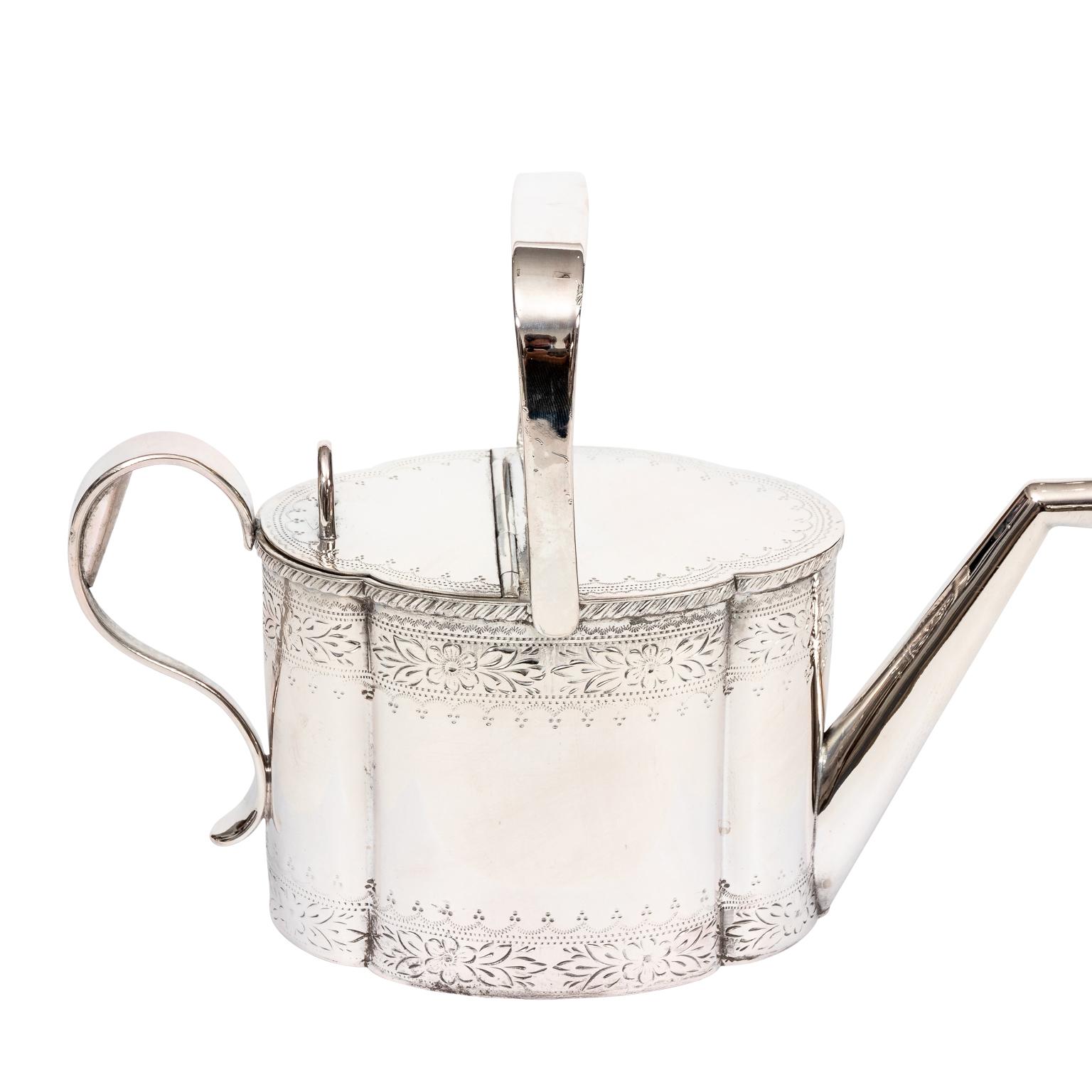 Edwardian style silver plate watering can with floral border trim, circa 1900s. Please note of wear consistent with age. Made in England.