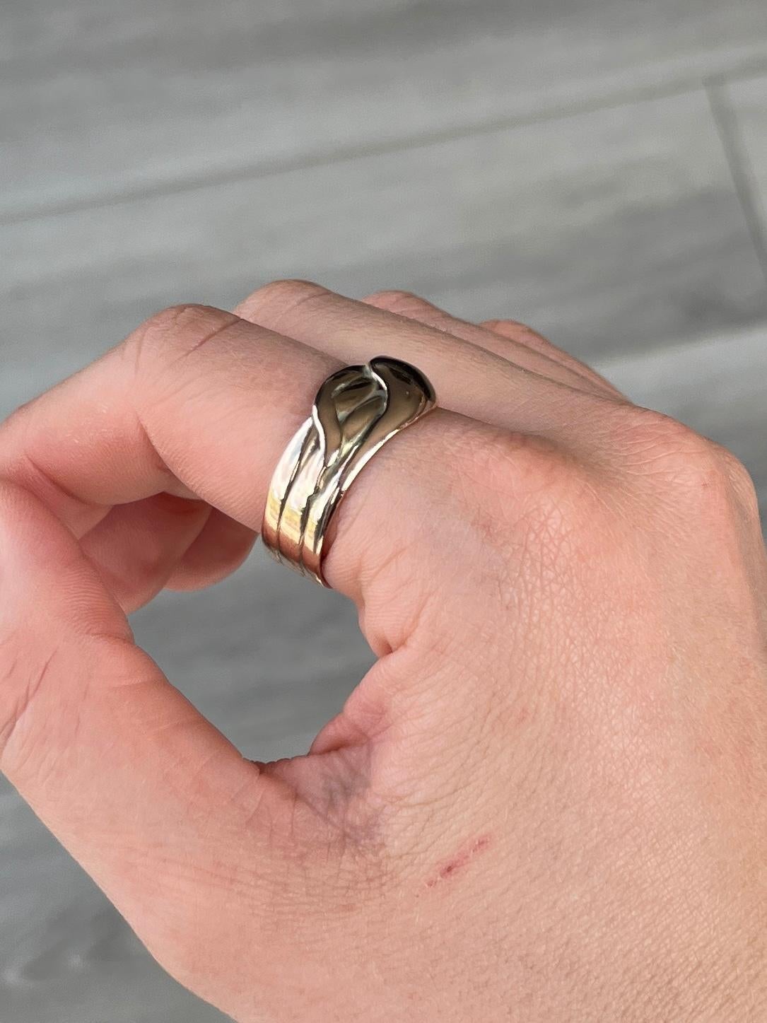Snake rings are always a winner in my book! This snake in particular is modelled in 9ct gold and wraps around your finger beautifully. 

Ring Size: X or 11 1/2 
Band Width Widest Part: 11mm

Weight: 5.6g