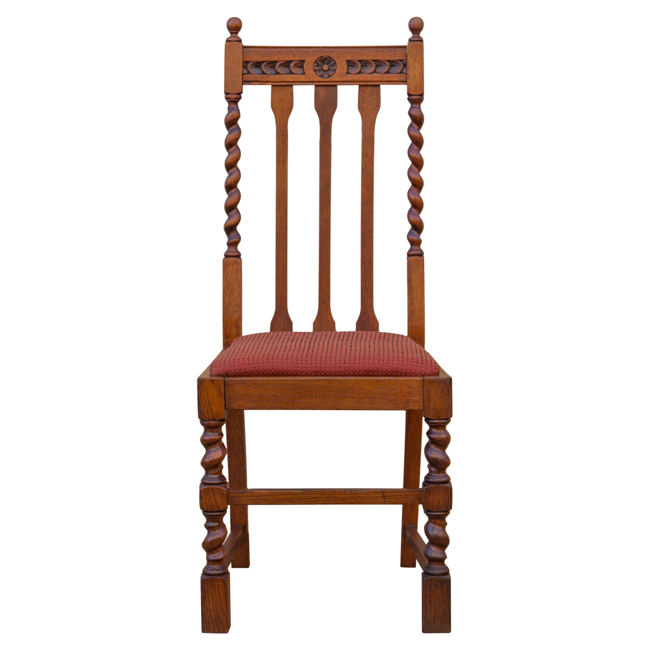 Shipping. Maker not on list.

Antique solid oak high back Edwardian barley twist side chair or dining chair by John M Smyth & Co, c 1910. Attractive oak grain with rich dark honey color. Beautiful hand-carved detail on crest rail with barley twist