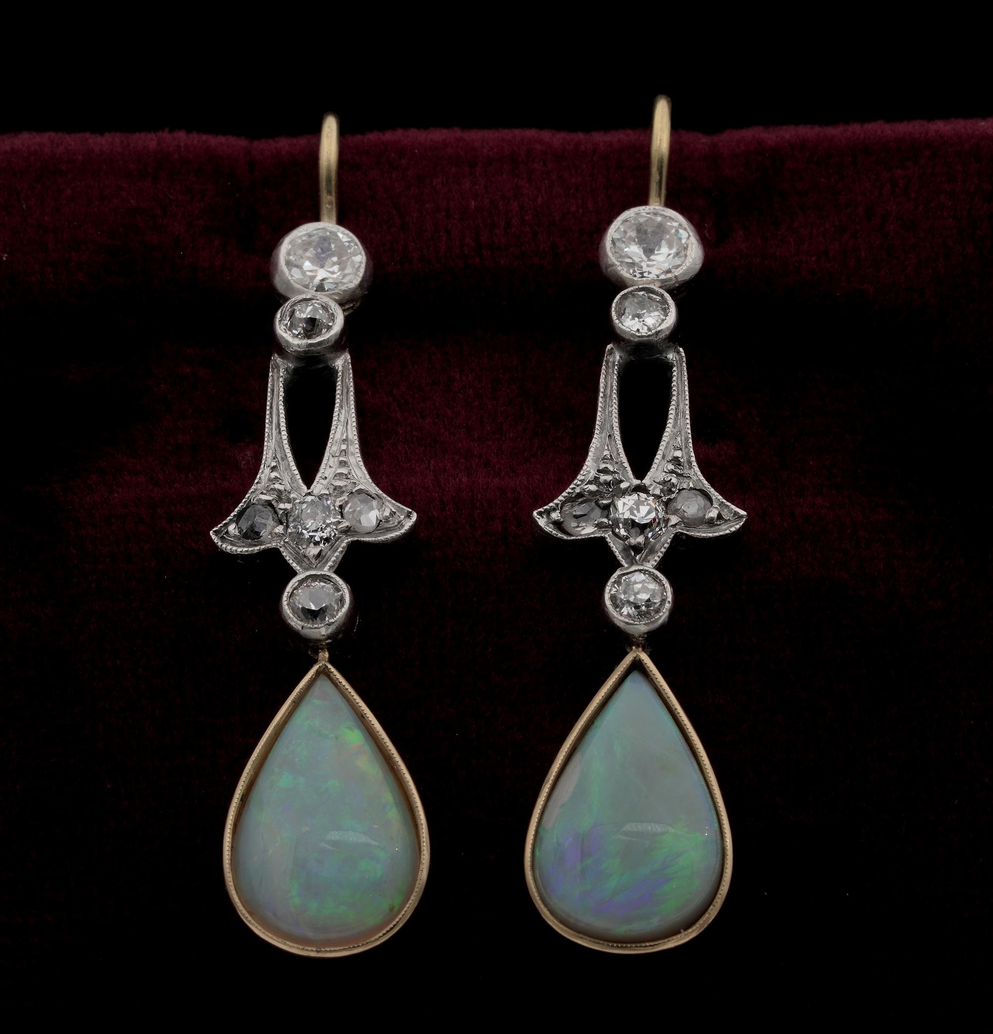 Grace and Femininity

Past charm and grace expressed in these beautiful pair of Edwardian period Opal & Diamond ear drops
Fine hand crafting of the period of solid 18 KT gold topped by silver at some points
Top line is of graceful sinuous lines with