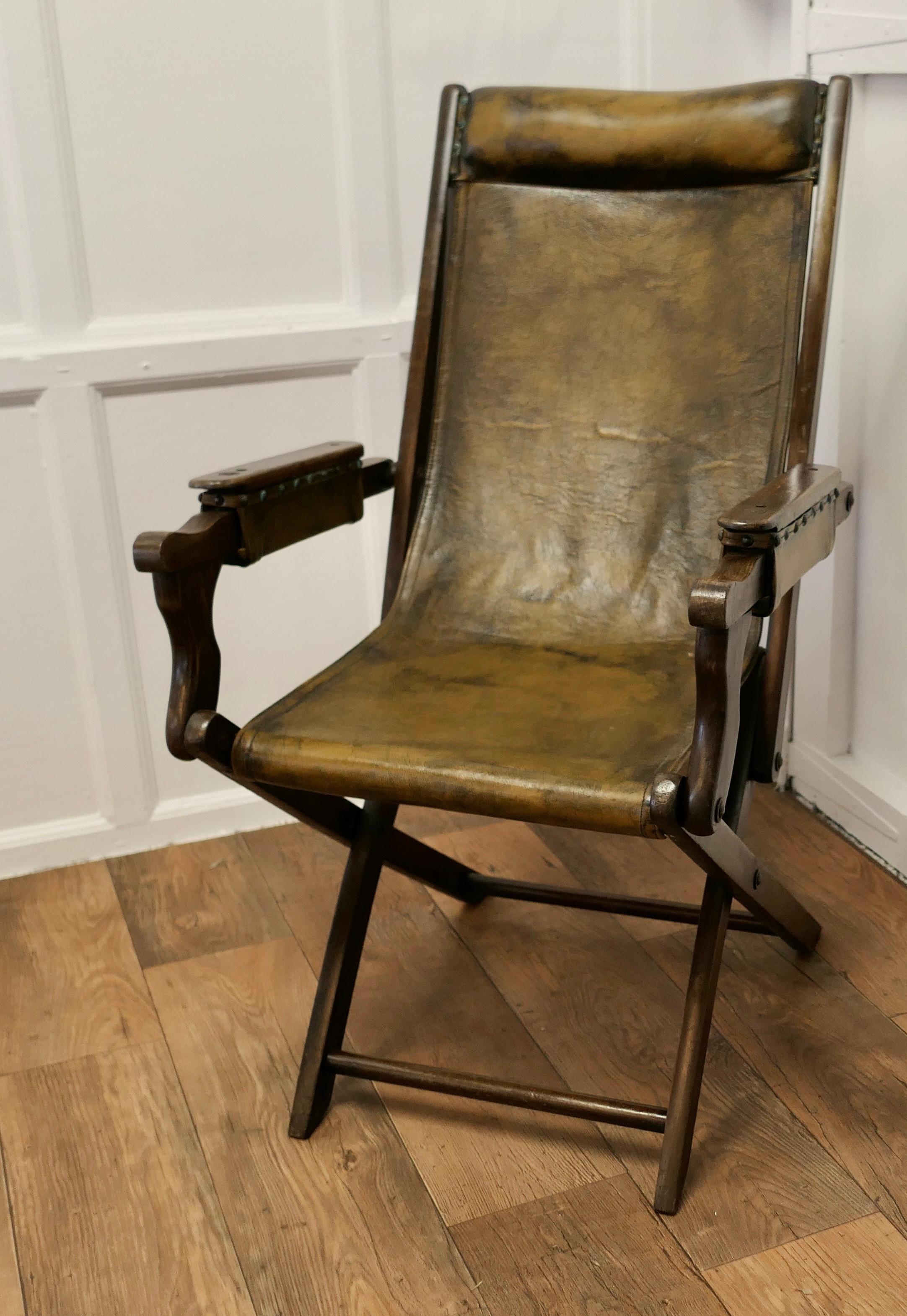 Edwardian Steamer Chair, Folding Leather Deck Chair


Edwardian Steamer Chair or Folding Campaign Deck Chair, the chair is made in beech and is upholstered with Olive green leather 
Dating from circa 1900 the upholstered folding frame has double