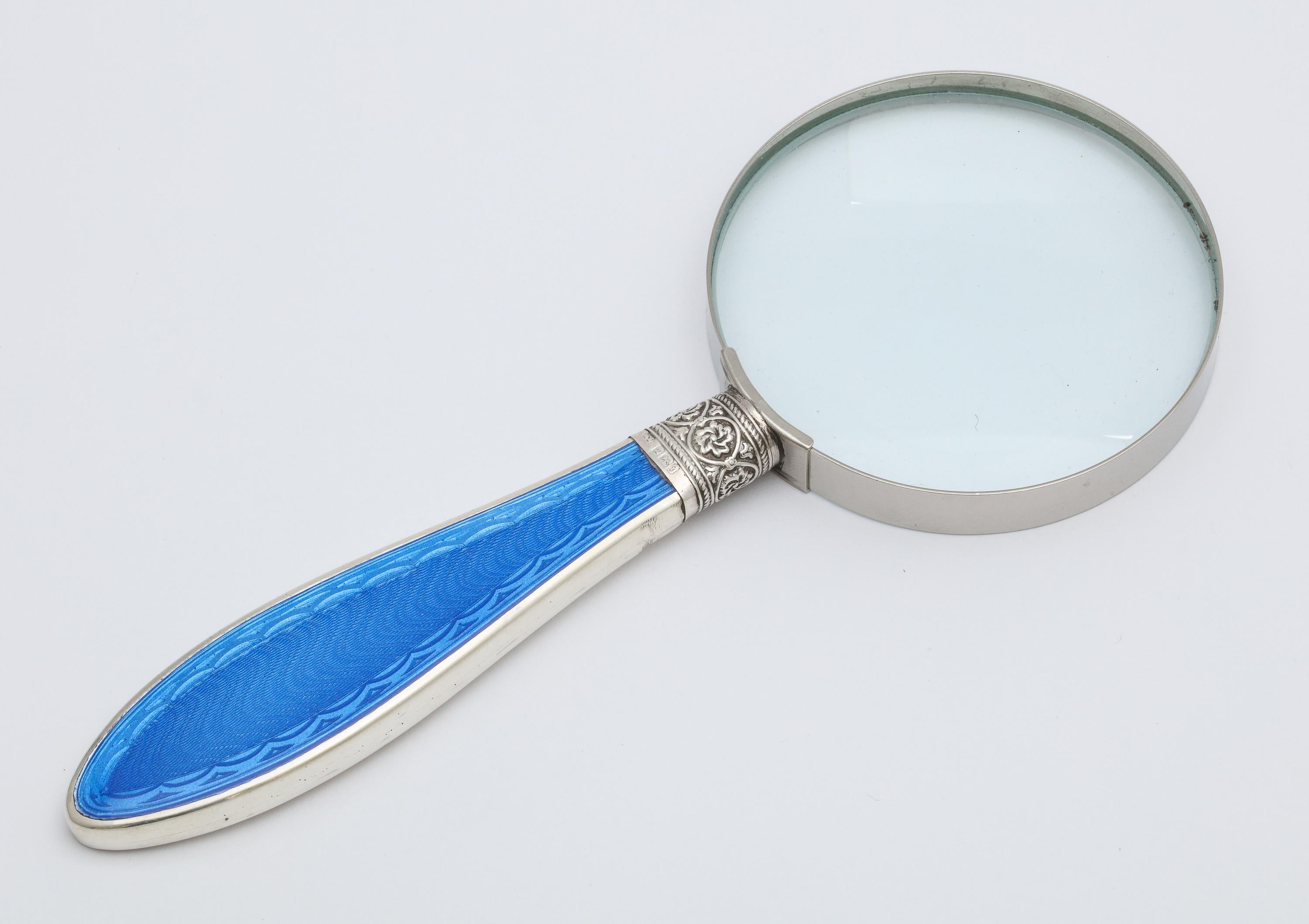 Edwardian, sterling silver and dark blue guilloche enamel, mounted magnifying glass, Sheffield, England, 1901- William Yates - maker. Dark blue guilloche enamel, which is on one side of the handle, has a beautiful border. The enamel seems to shimmer