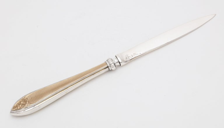 Edwardian, sterling silver and guilloche enamel-mounted letter opener, Sheffield, England, year-hallmarked for 1921, Mappin and Webb - makers. The guilloche enamel shimmers with a golden hue in the light. Enamel is on one side of the handle. The all
