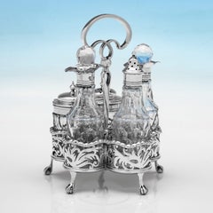 Edwardian sterling silver and glass cruet set by Goldsmiths & Silversmiths 1908