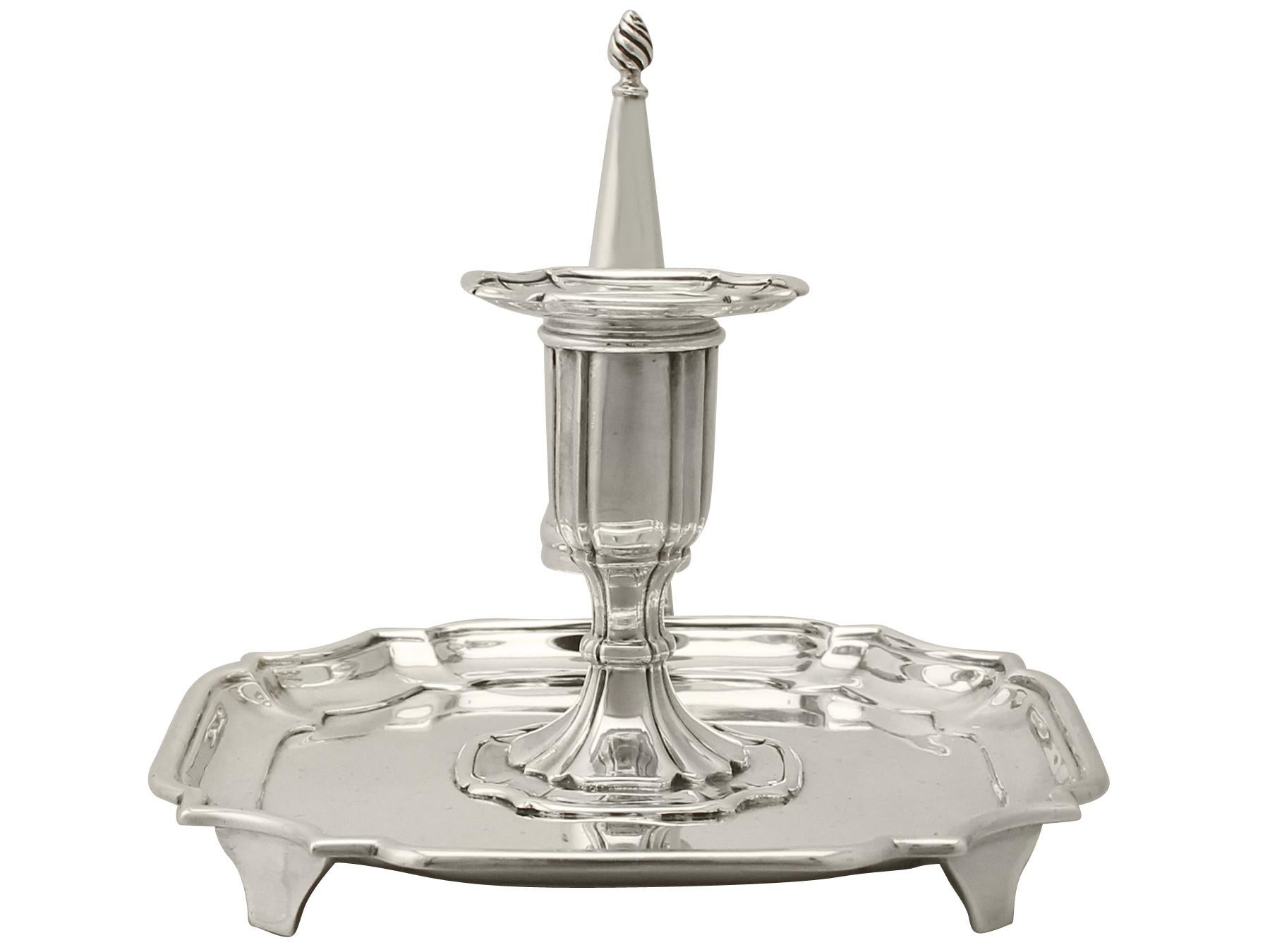 An exceptional, fine and impressive antique Edwardian English sterling silver chamber candlestick, part of our range of ornamental silverware

This exceptional antique Edwardian chamber candlestick in sterling silver has a square shaped form, in