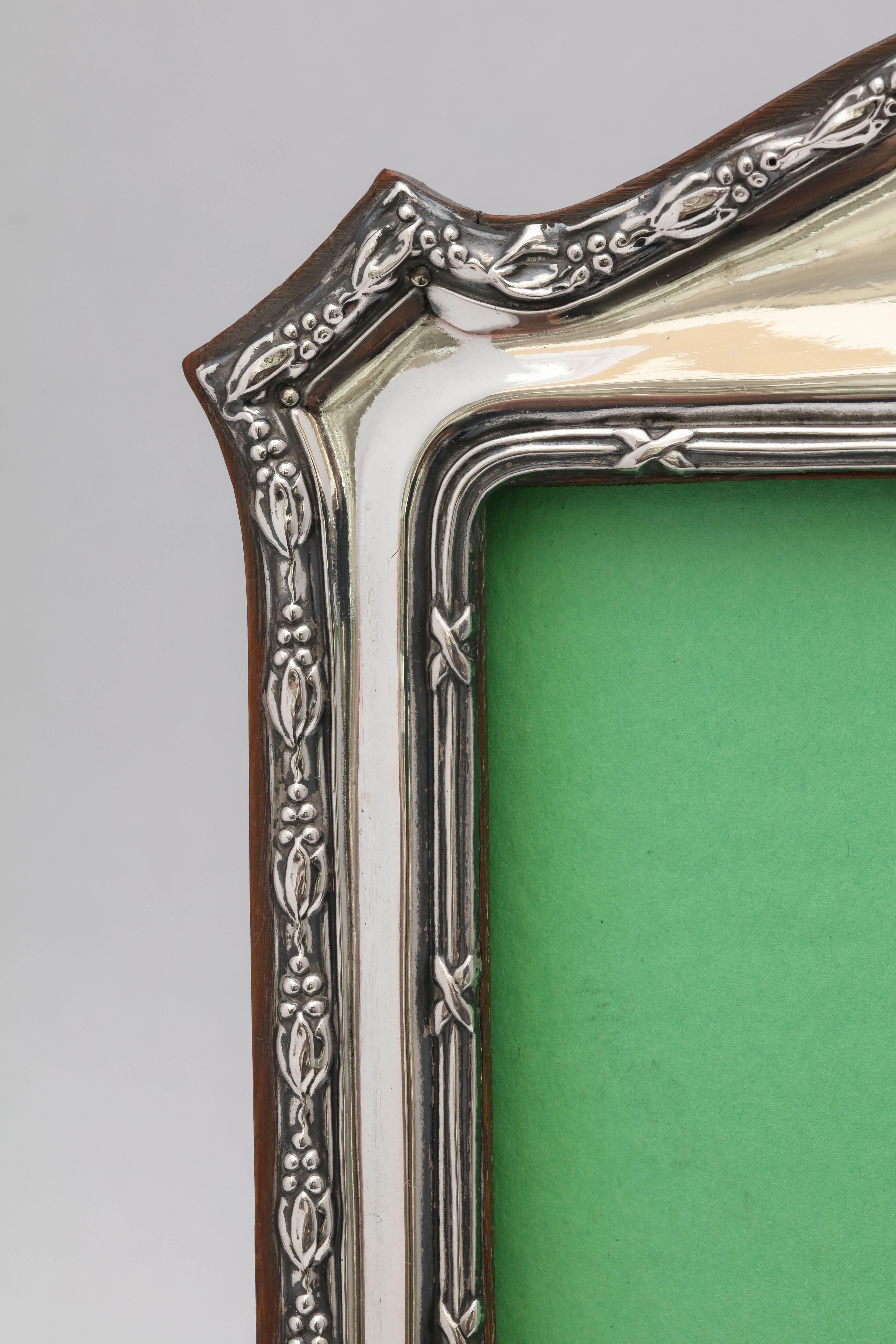 Early 20th Century Edwardian Sterling Silver Footed Hump Top Picture Frame with Wood Back