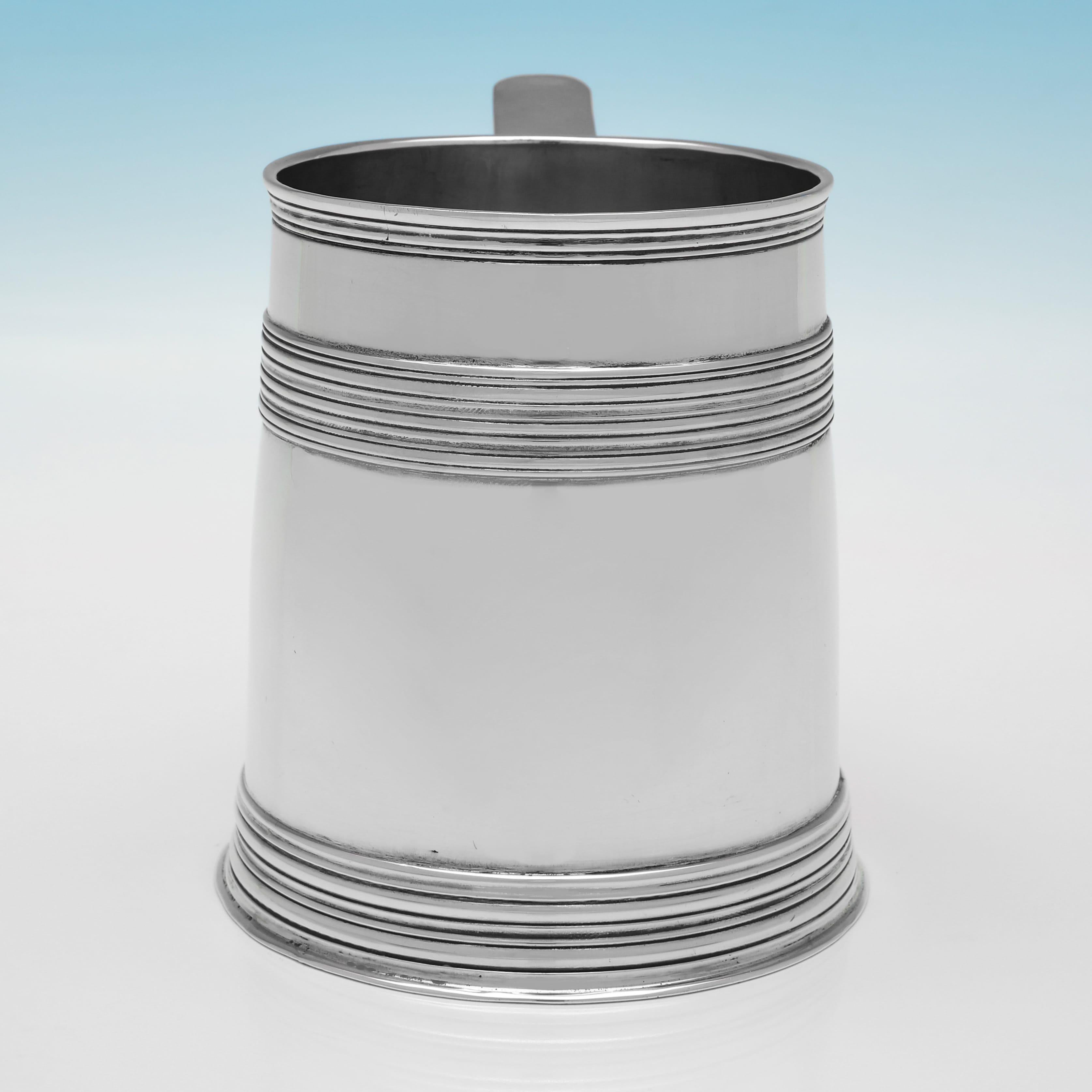 Hallmarked in London in 1901 by Arthur Sibley, this handsome, Antique, Edwardian Sterling Silver Mug, is straight sided, with reed detailing throughout. The mug measures 4.5