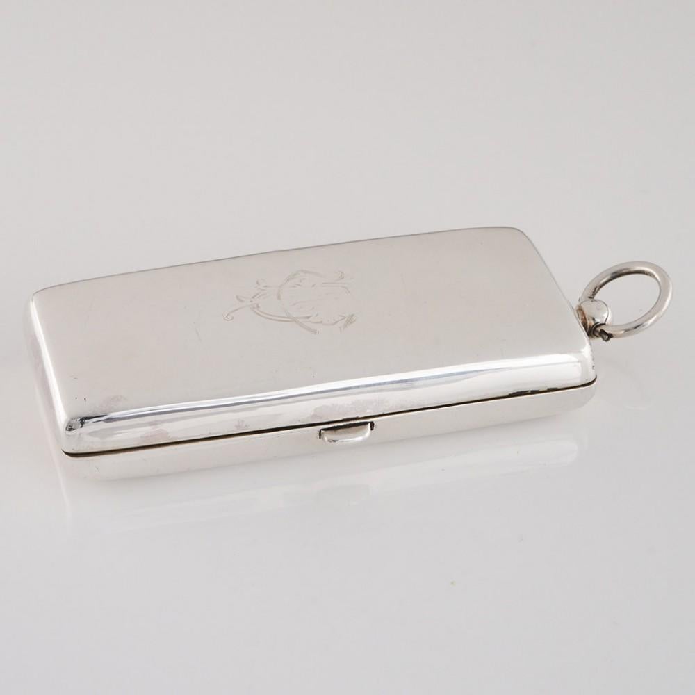 Heading : Edwardian Sterling Silver Sovereign Case
Date : Hallmarked in Birmingham 1906.
Period : Edward VII
Origin : Birmingham England
Decoration : Rectangular body with push button release. Spring loaded holders for sovereigns, half sovereigns
