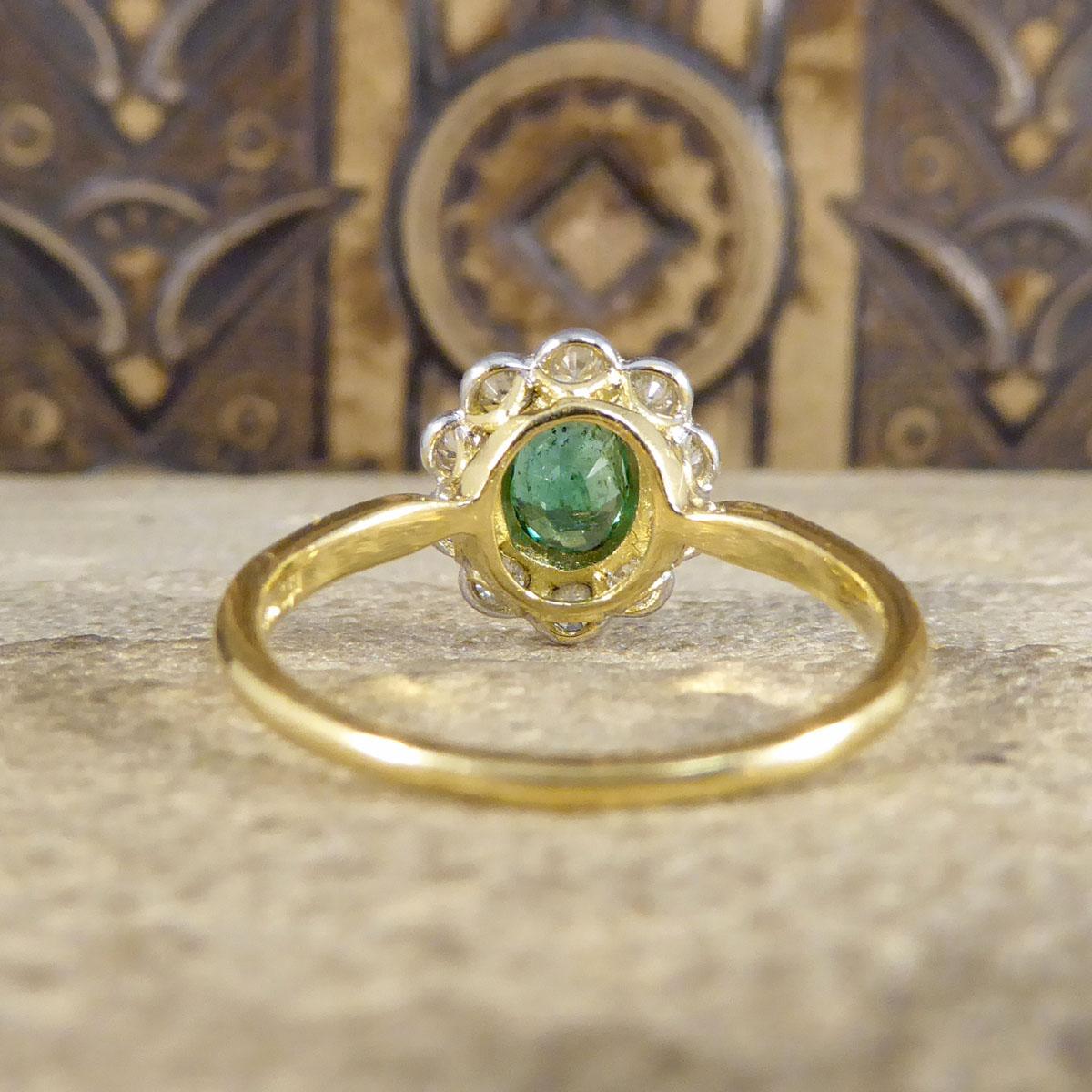 Edwardian Style 0.60ct Emerald and Diamond Cluster Ring in 18ct Gold In Excellent Condition In Yorkshire, West Yorkshire