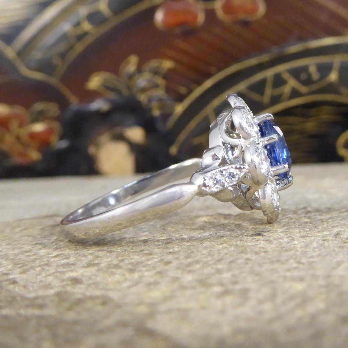 Round Cut Edwardian Style 1.50ct Sapphire and 1.10ct Diamond Cluster Ring in Platinum For Sale