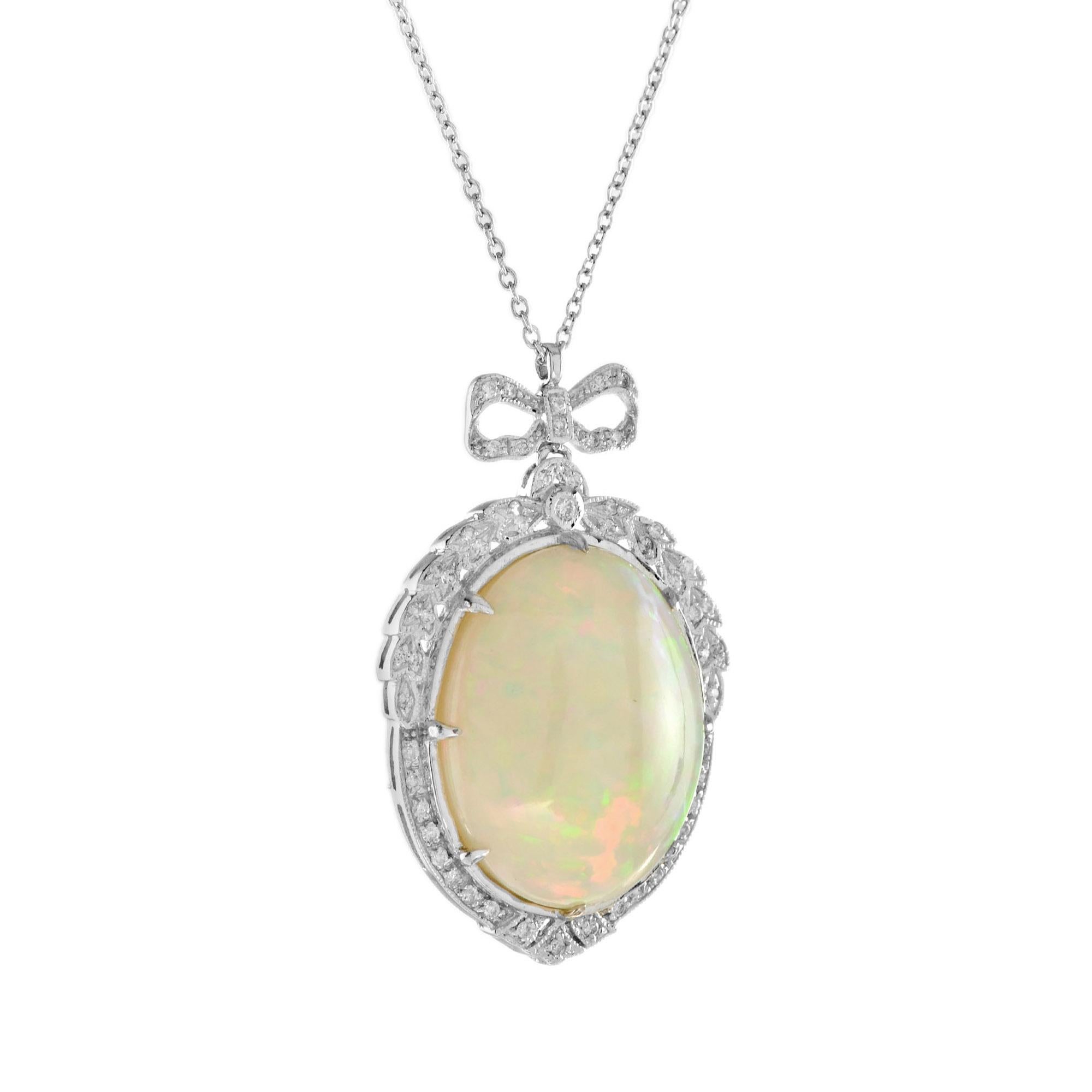 Collier pendentif en opale et diamant absolument fabuleux et unique ! Le pendentif comporte une opale éthiopienne ovale de 15,39 carats et 54 diamants de taille ronde. Véritable œuvre d'art, cette pièce unique compléterait à merveille toute