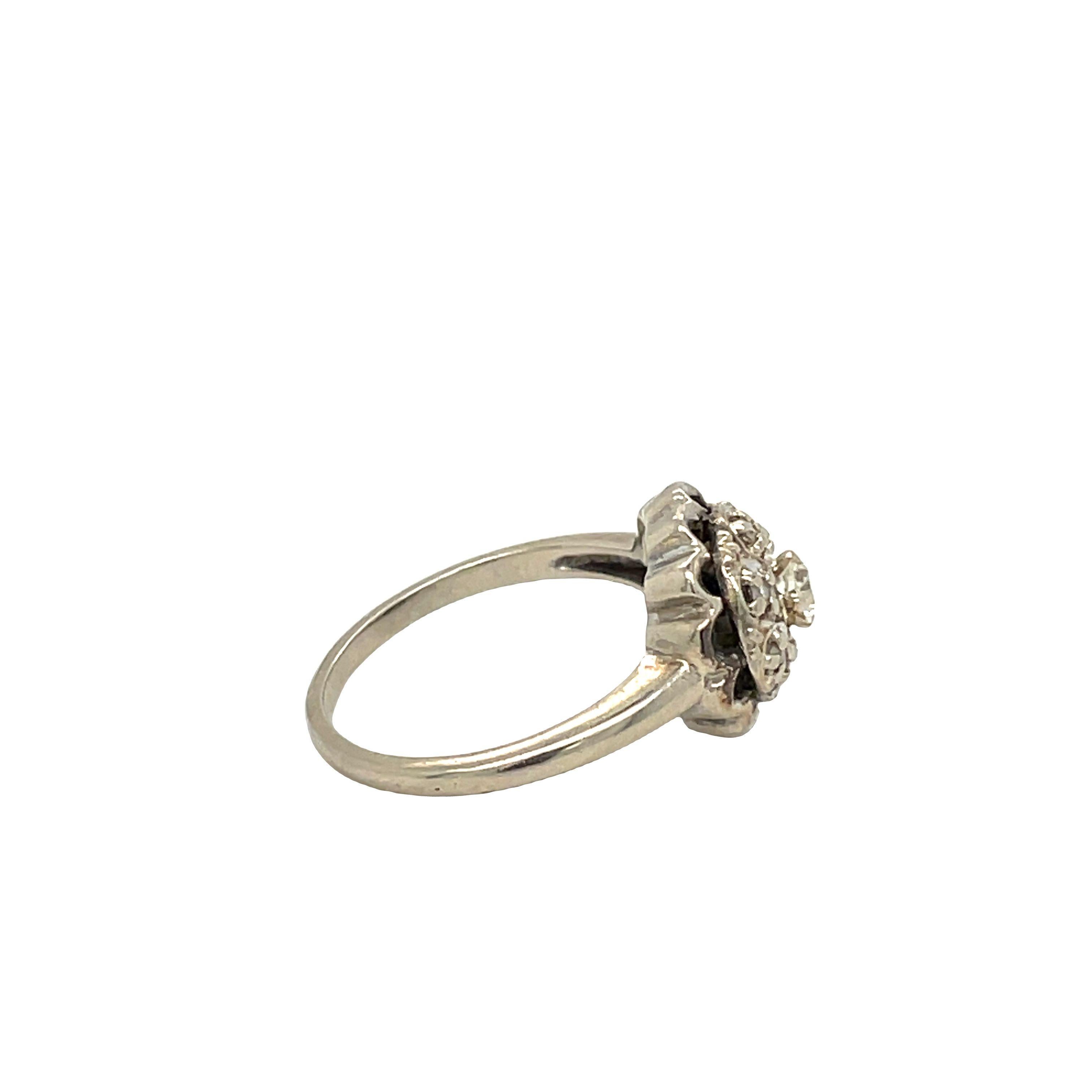 Old European Cut Edwardian 7 Diamond Cluster Ring with Scalloped Setting in 14k White Gold For Sale