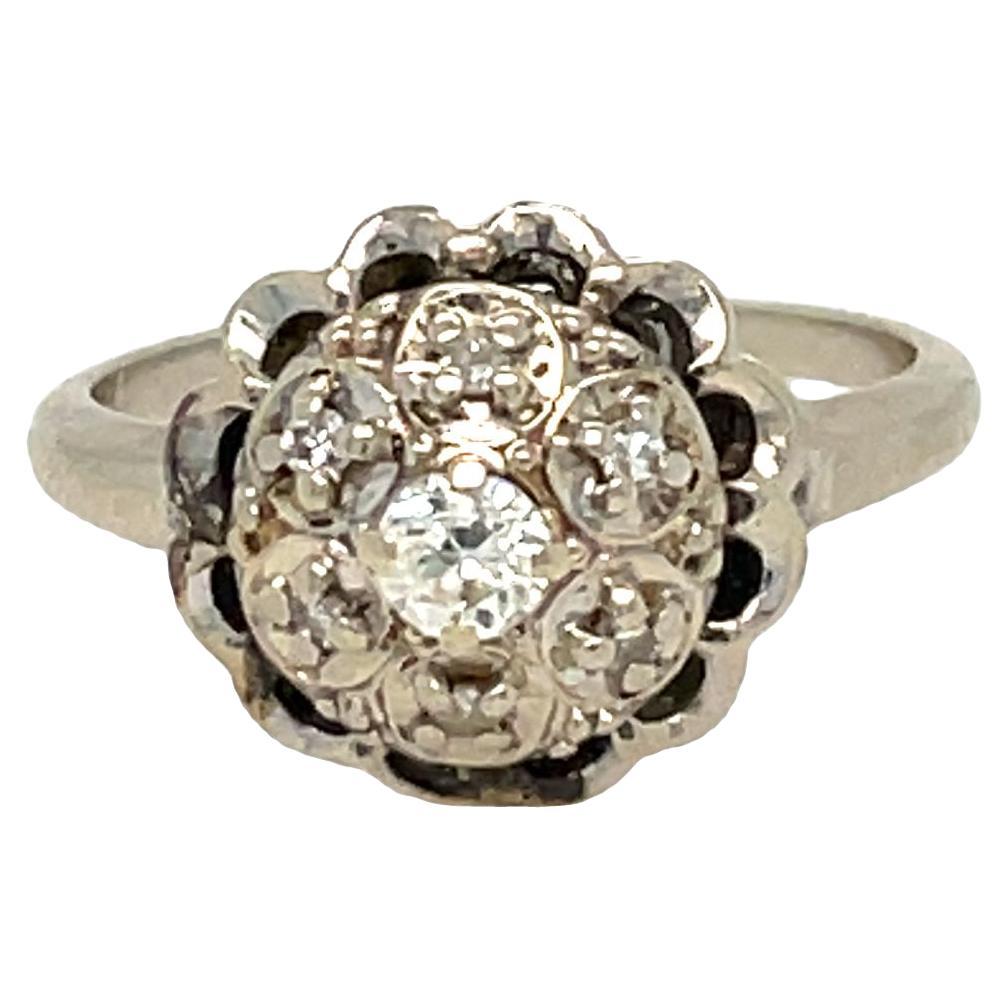 Edwardian 7 Diamond Cluster Ring with Scalloped Setting in 14k White Gold For Sale