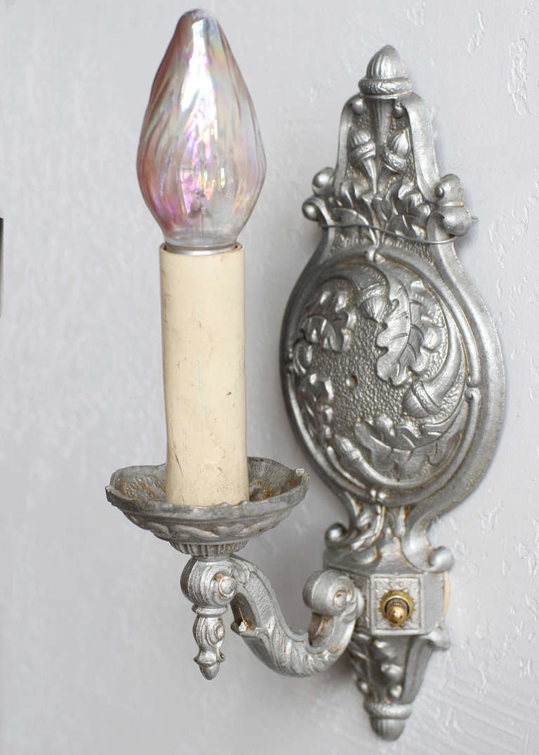 Edwardian-style aluminum wall sconce manufactured and stamped by 
