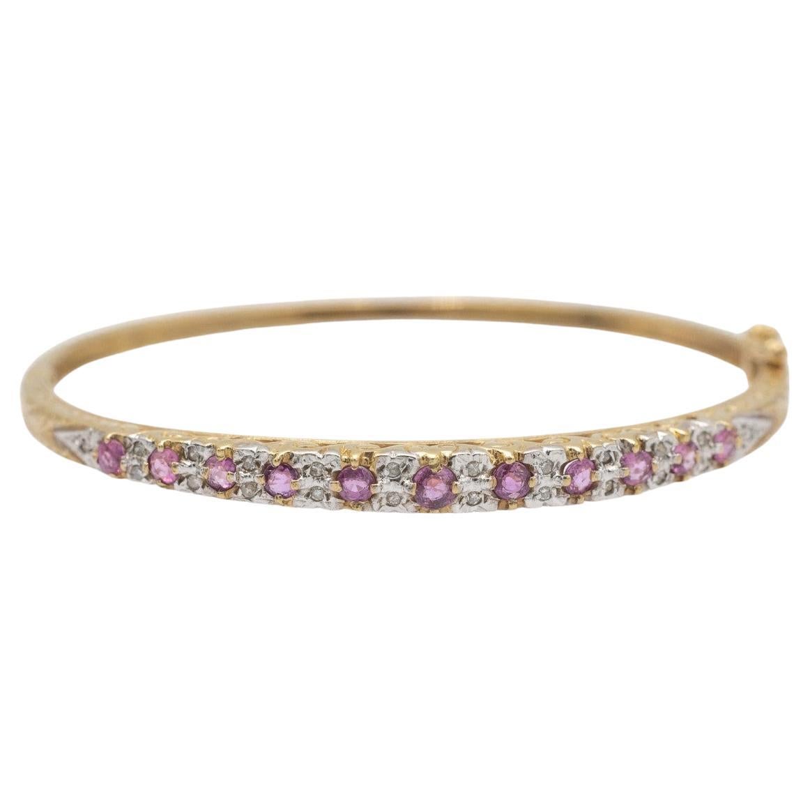 Edwardian style bracelet with diamonds and pink sapphires.