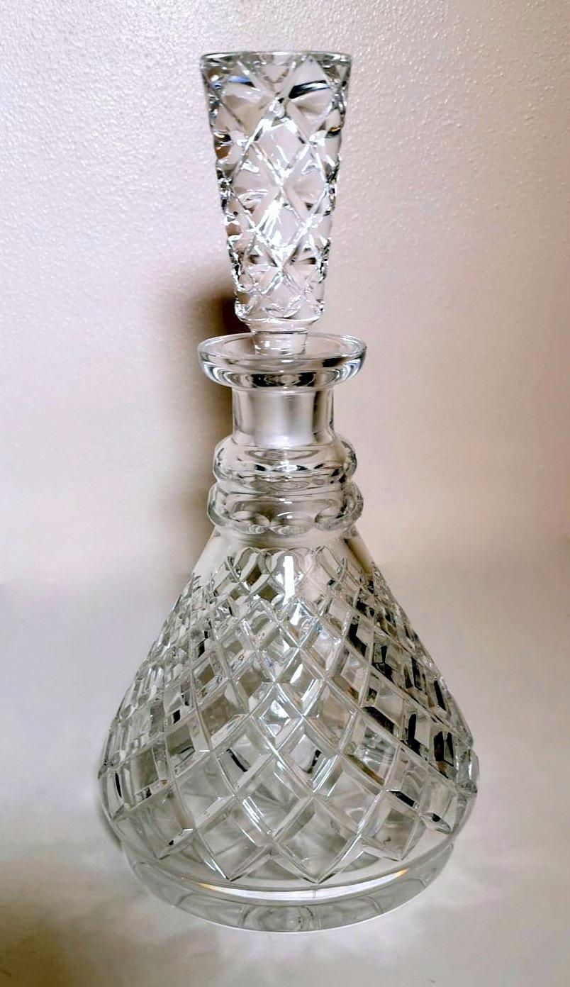 We kindly suggest you read the whole description, because with it we try to give you detailed technical and historical information to guarantee the authenticity of our objects.
Particular and elegant liqueur bottle made of cut and ground crystal;