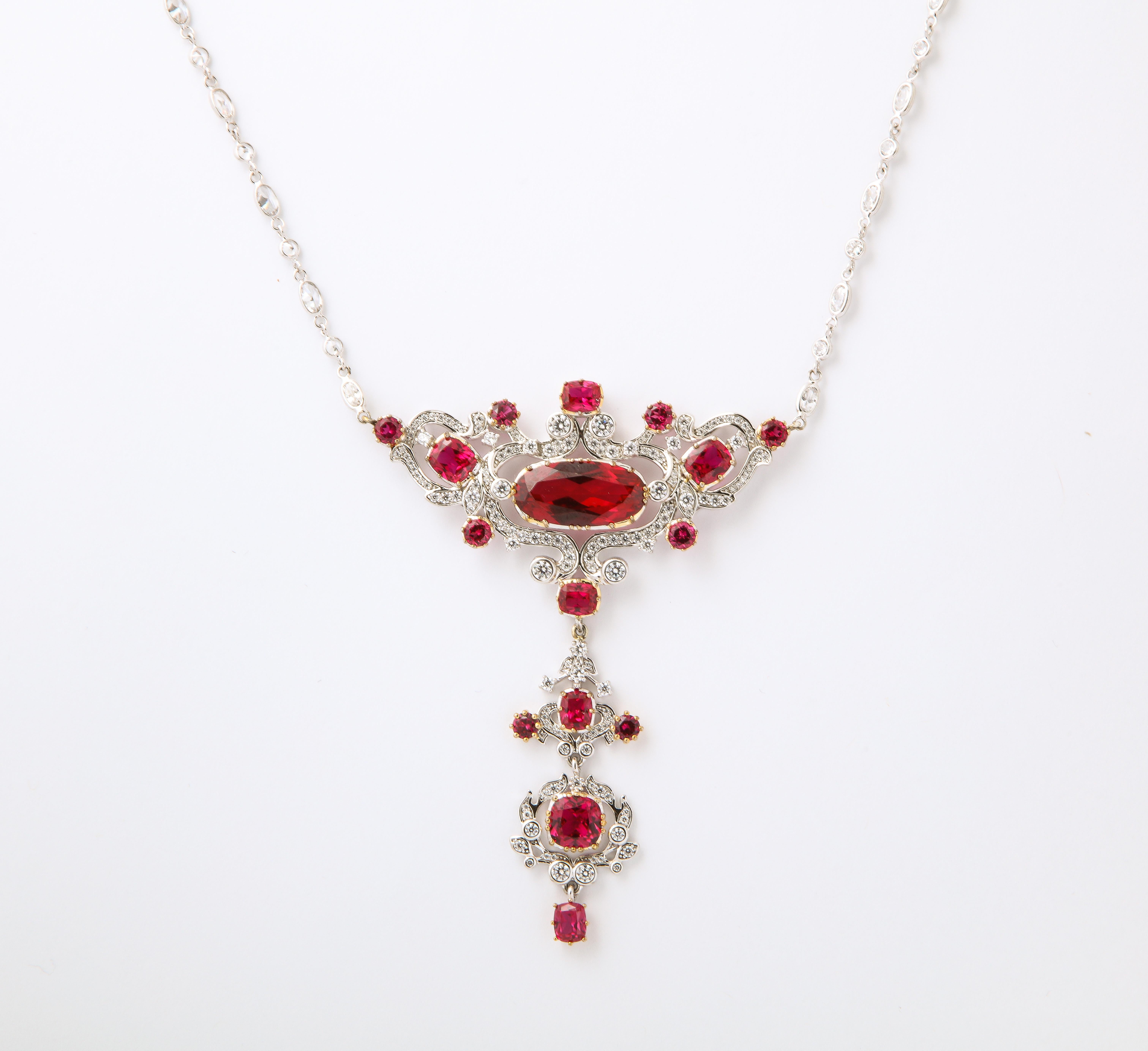 Edwardian Style Faux Pigeon Blood Ruby CZ Diamond Sterling Necklace
Almost straight from an historical jewelry collection, Art Nouveau Edwardian style delicate sterling CZ and man made rubies vermeil set  pendant hanging from a sterling CZ set