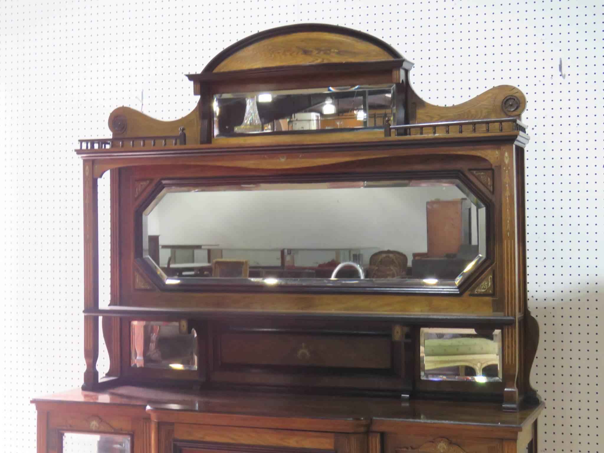 Edwardian style inlaid sideboard with superstructure. Three shelves on top with three doors and one shelf on the bottom.
